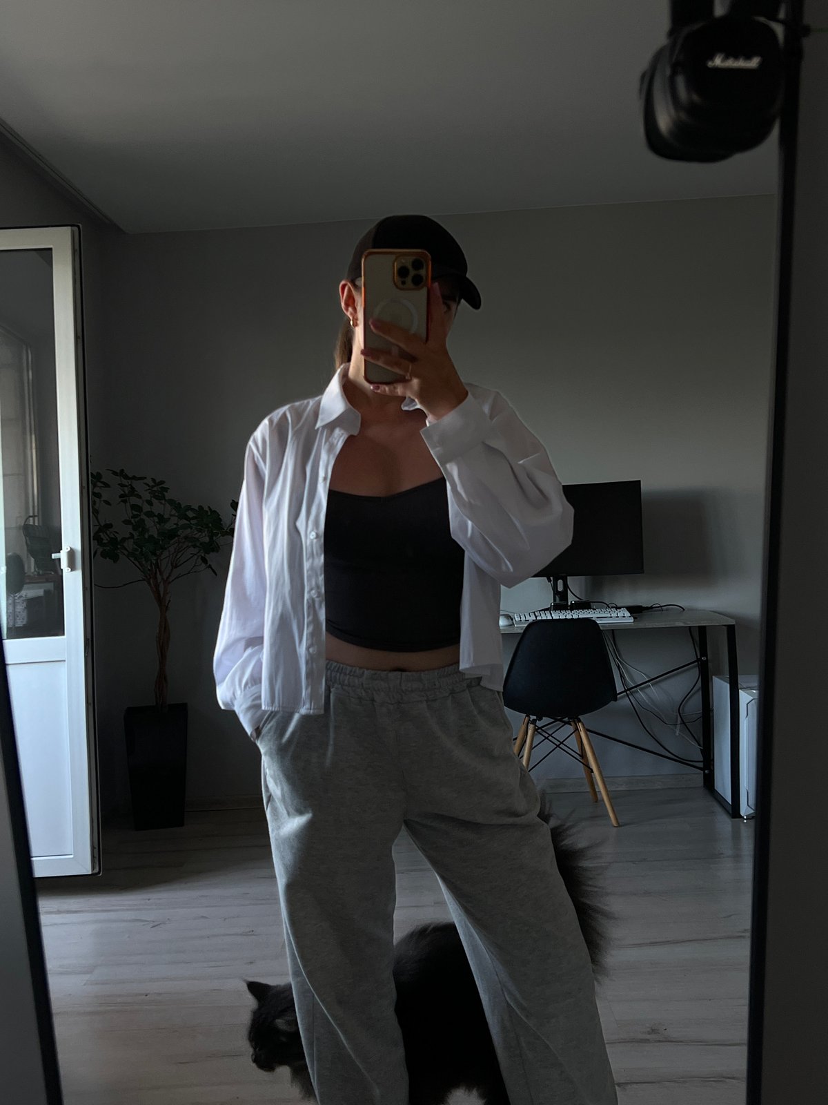 Mirror selfie in Ternopil with a cat in the background