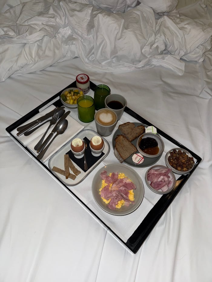 Elaborate breakfast in bed served in Paris room