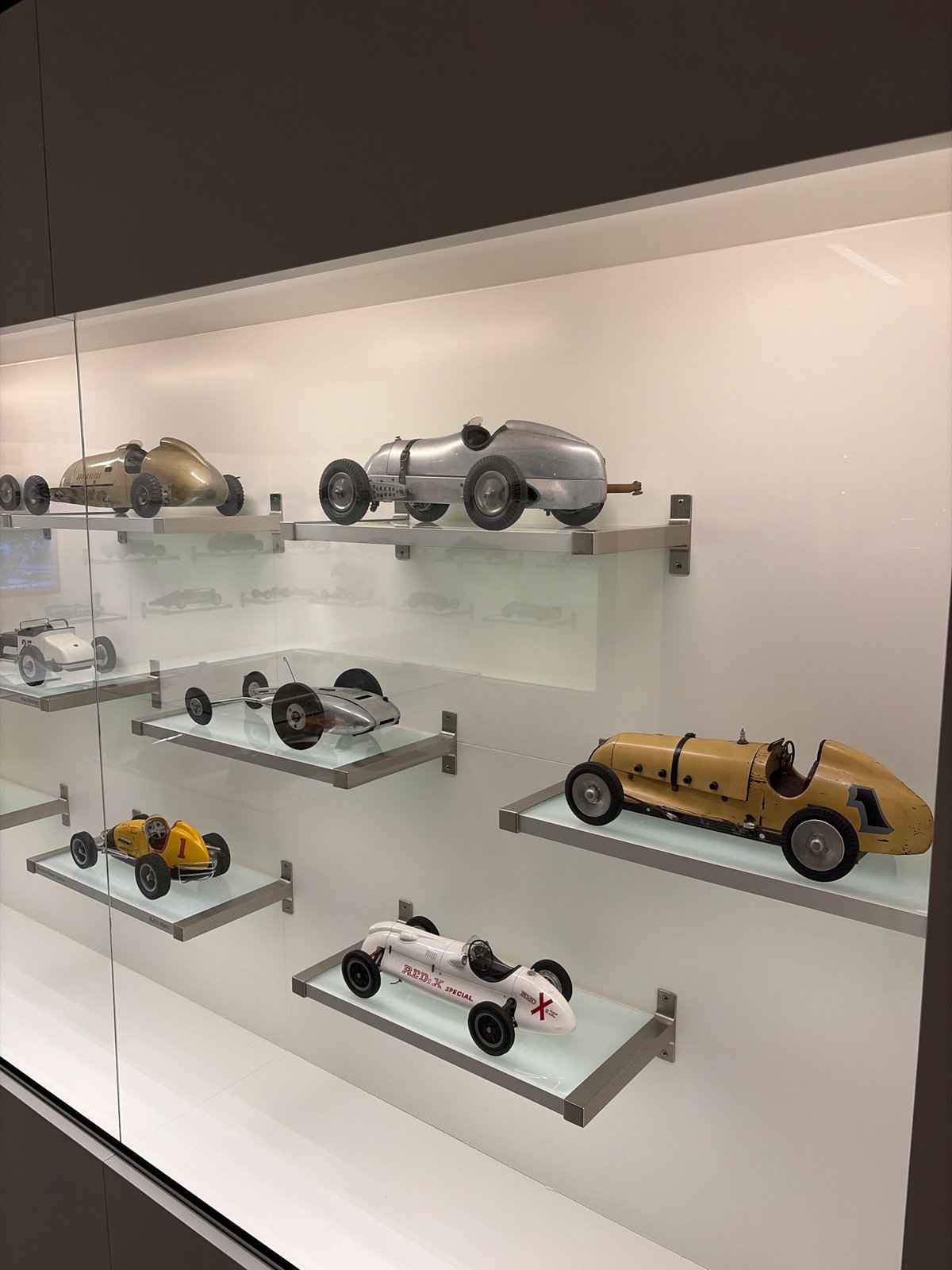 Visitor documents vintage car exhibits at Hague area museum