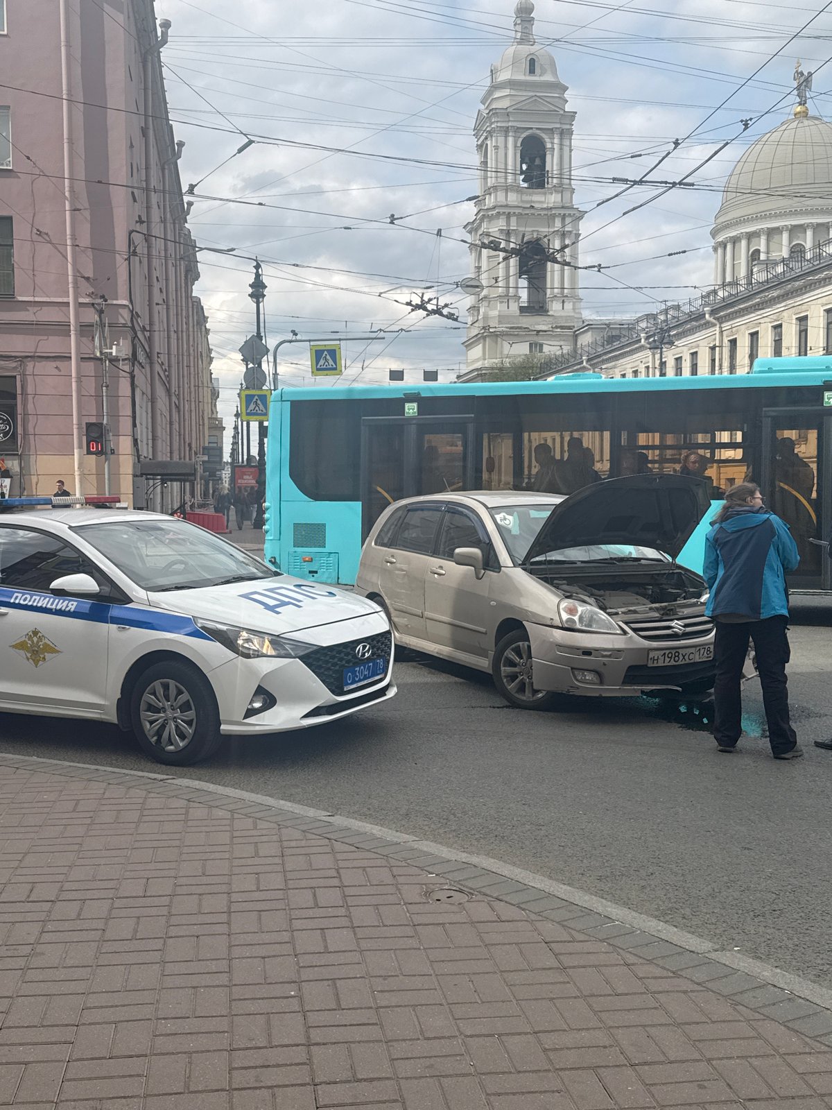 Ordinary Tuesday morning unfolds across Saint Petersburg streets and waterways