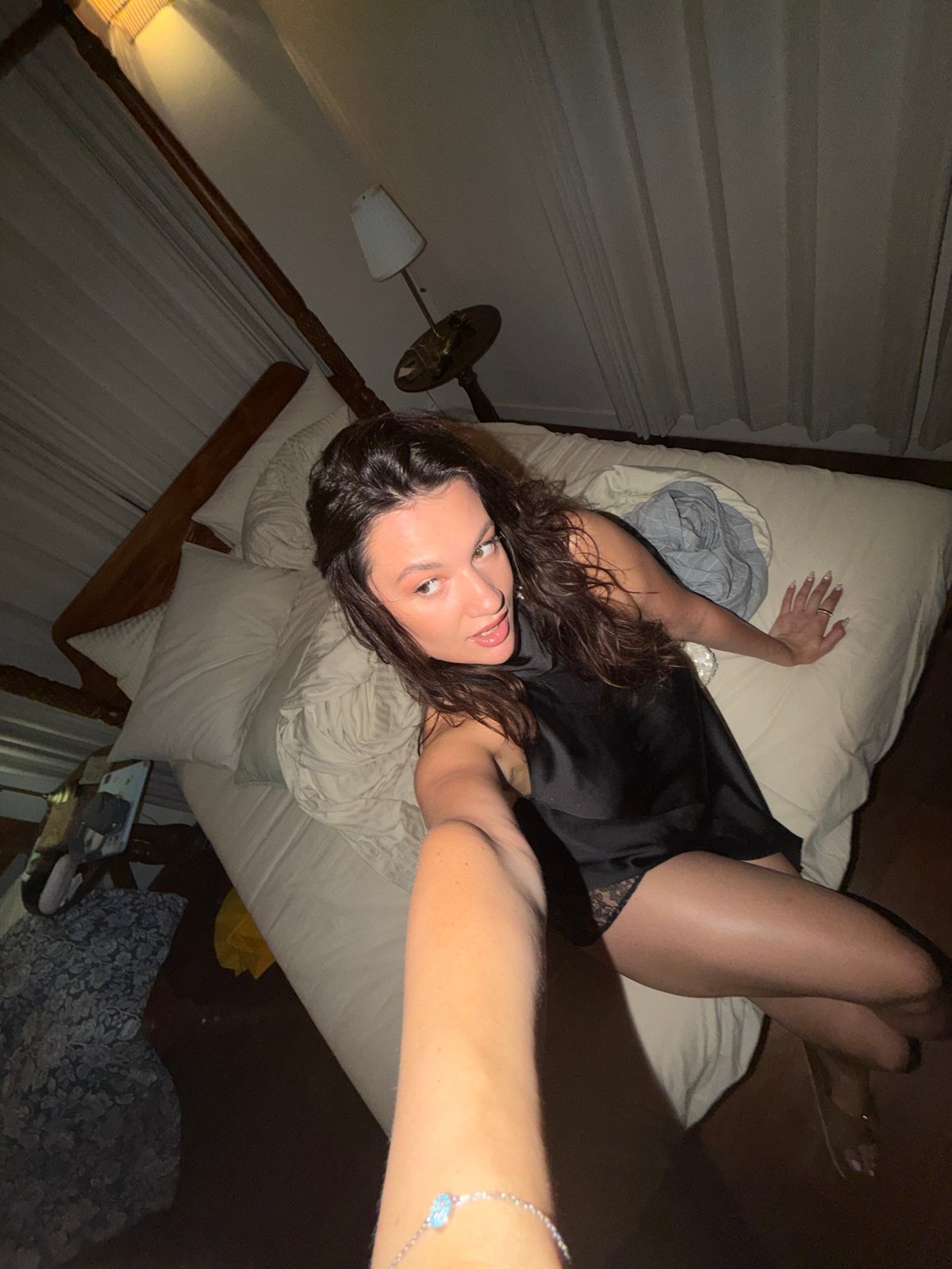 Women capture personal moments indoors in North Kuta