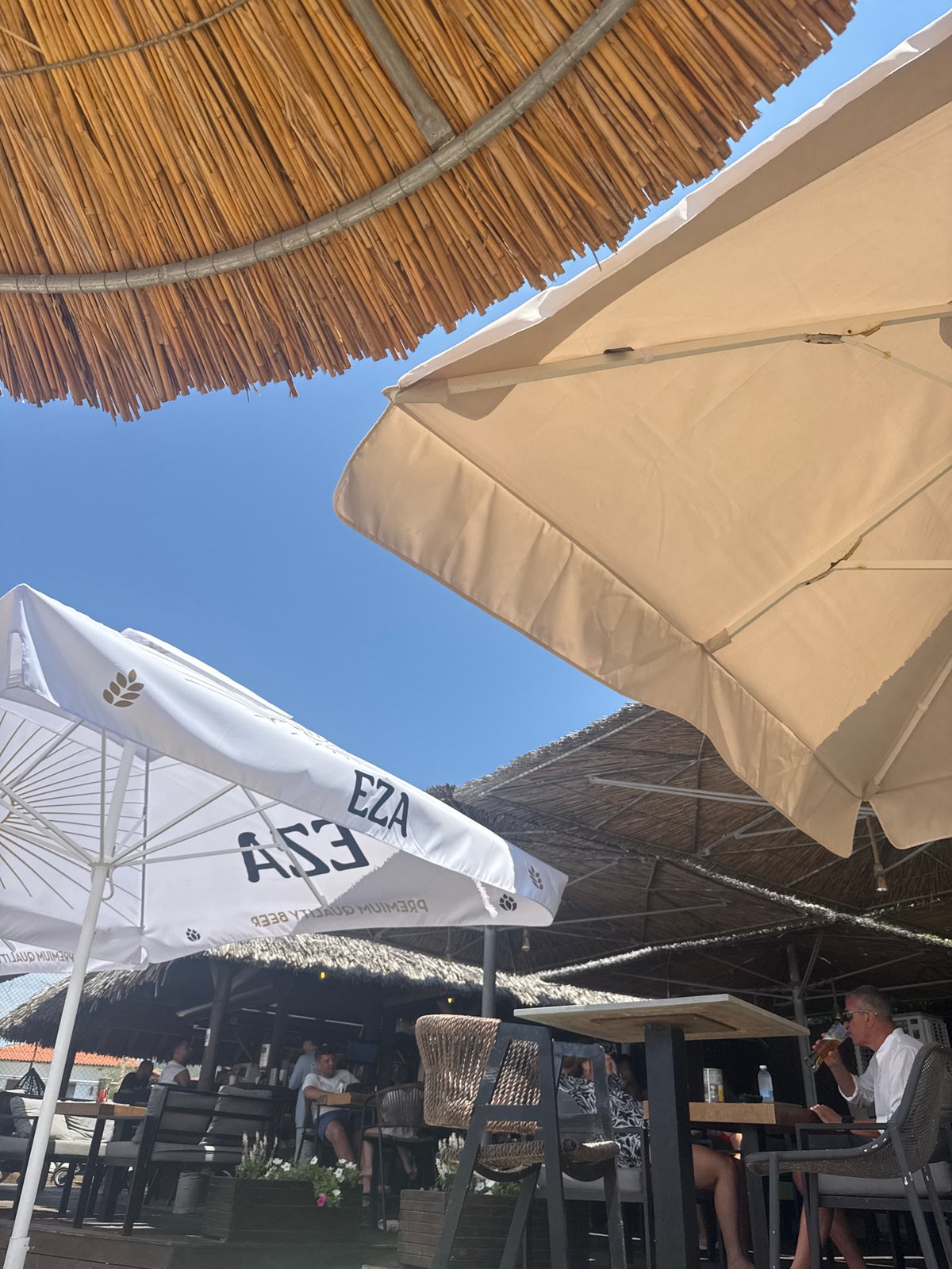 Chilling at a Sithonia beach club on a sunny July day