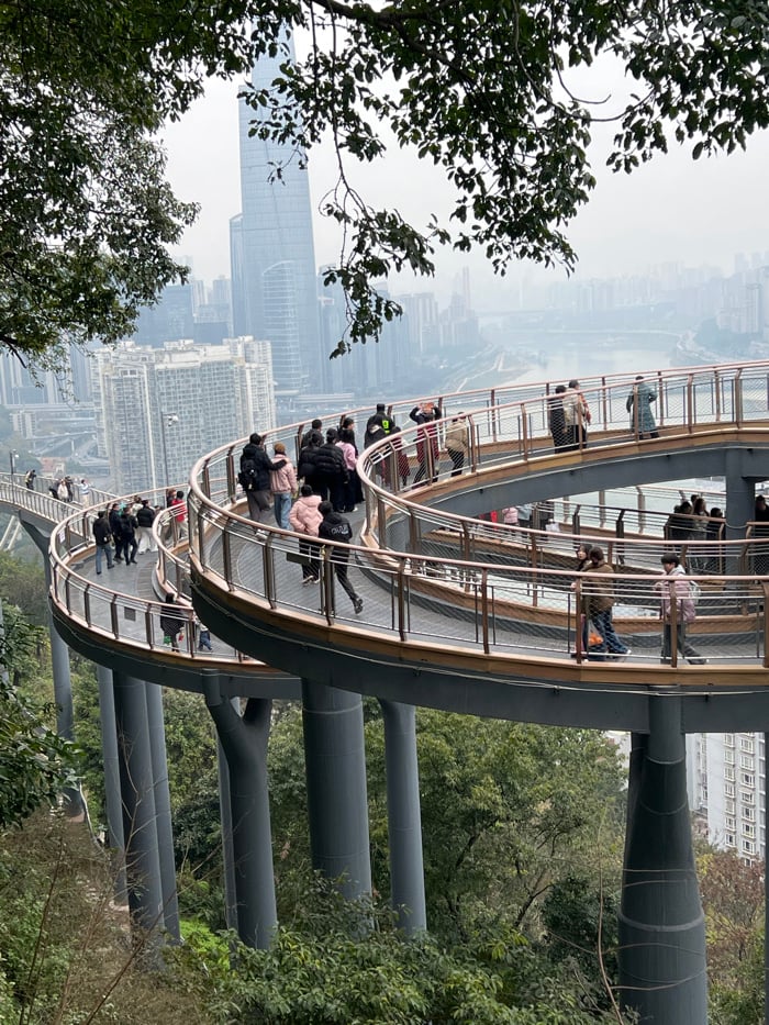 Early morning tourist activity observed across Yuzhong District walkways
