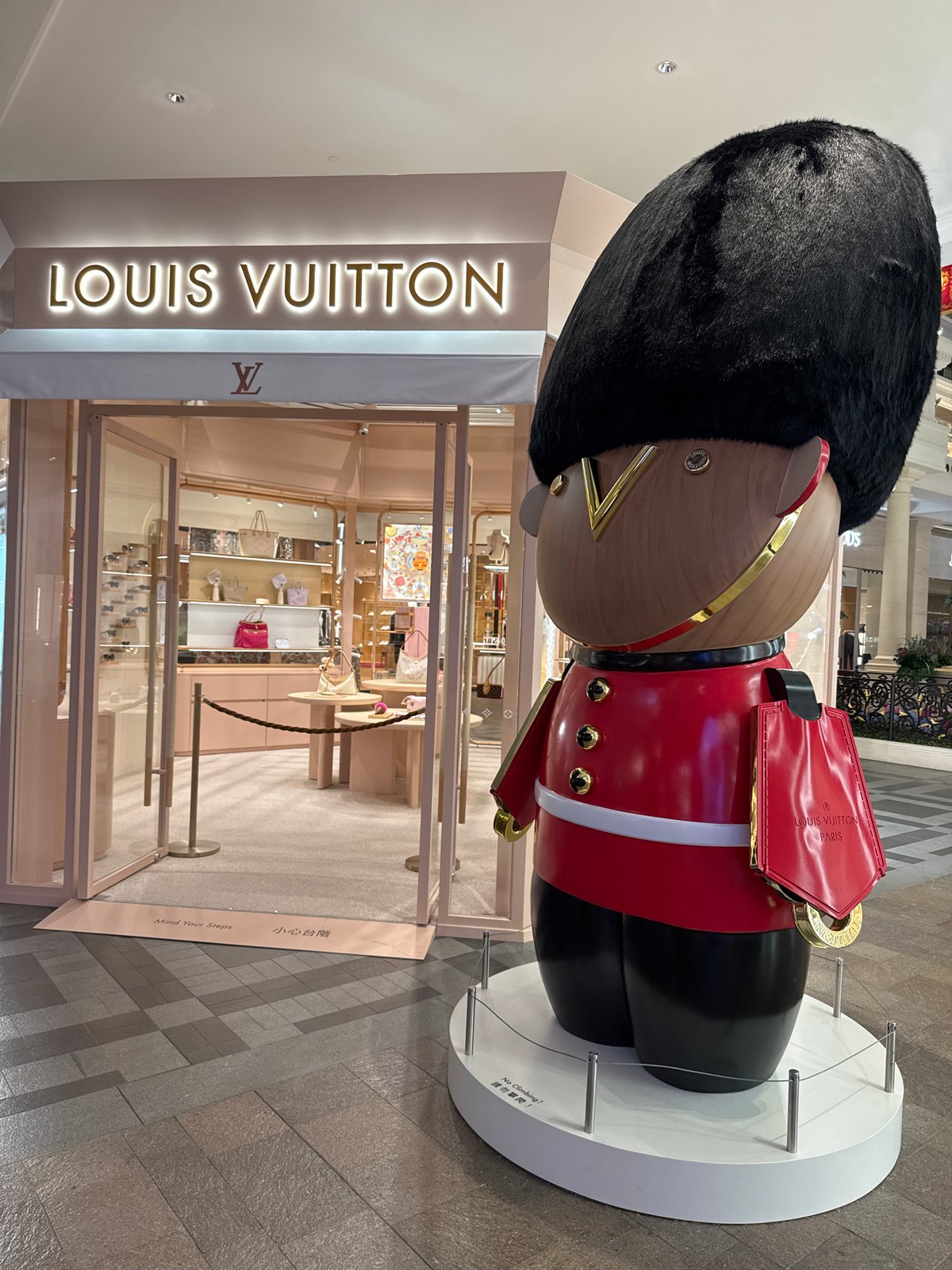 Tourists explore British-themed Londoner Macao resort complex Saturday afternoon