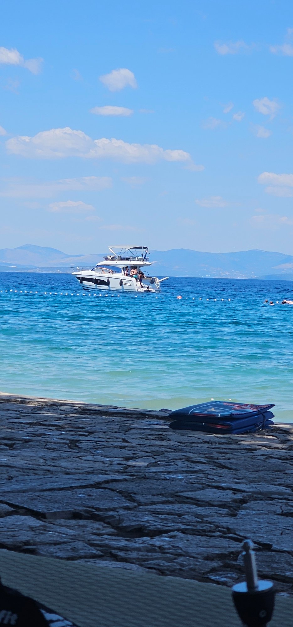 Busy summer morning on the water and beaches of Supetar