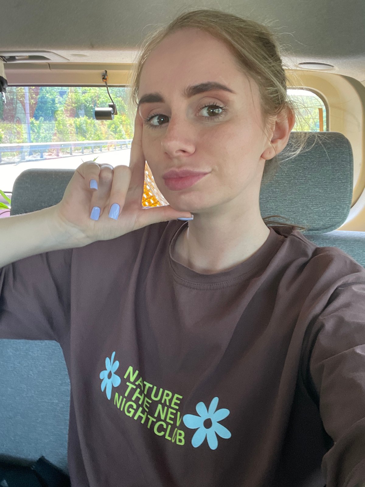 Woman takes selfie in vehicle in Vladivostok