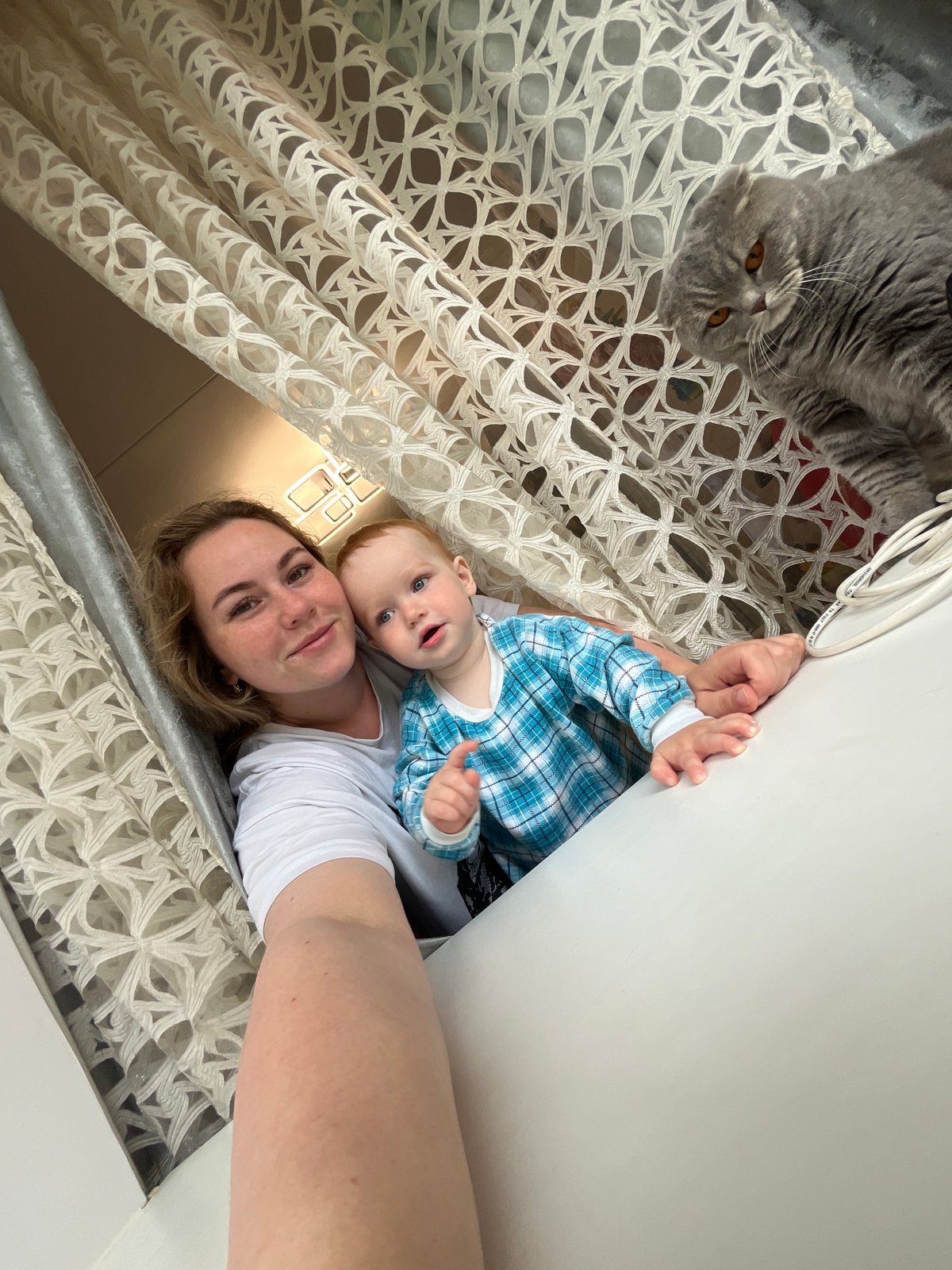 Family moments with cat captured in Chaikovsky home