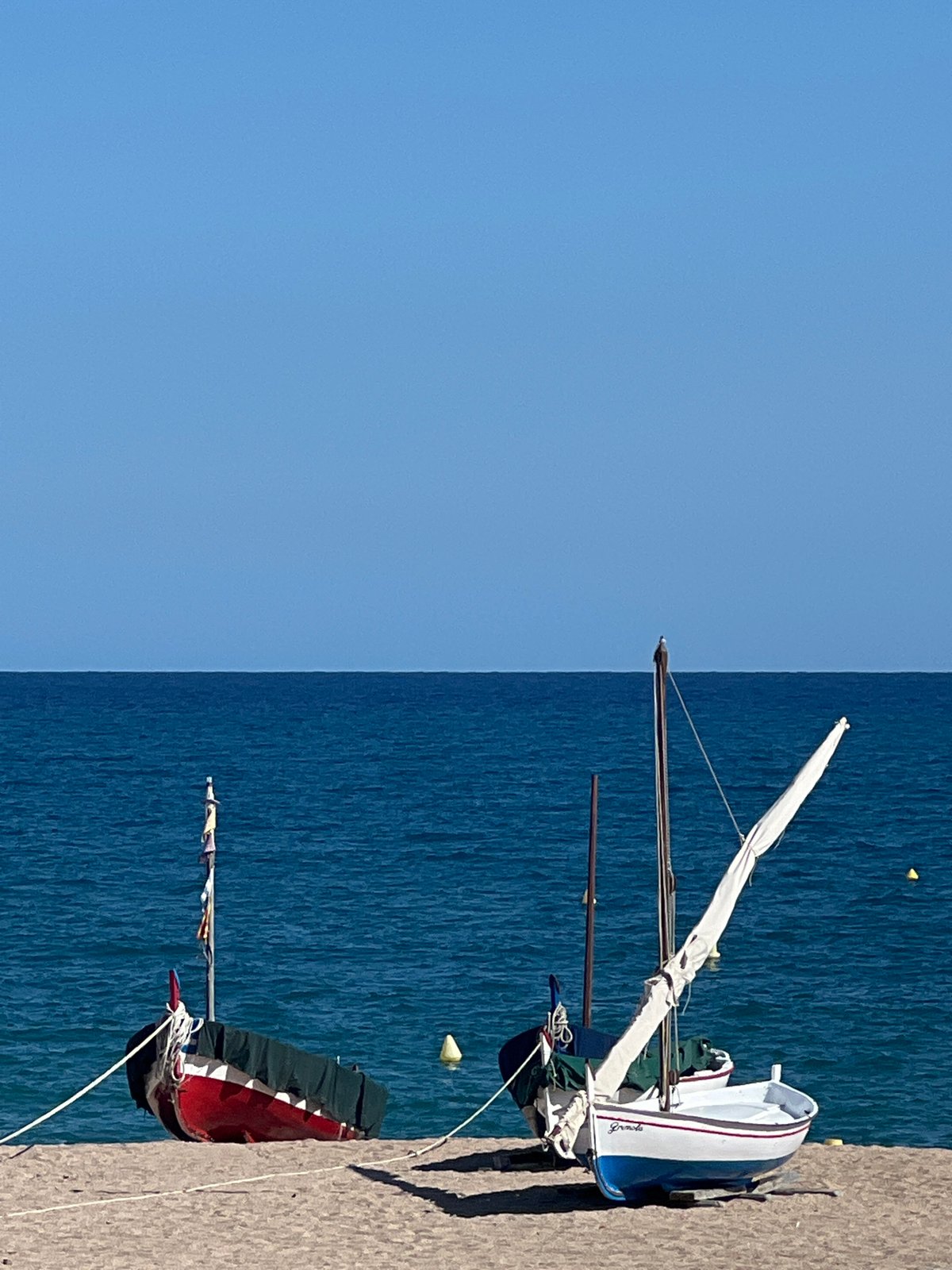Coastal scenes and directional signage documented in Sant Pol