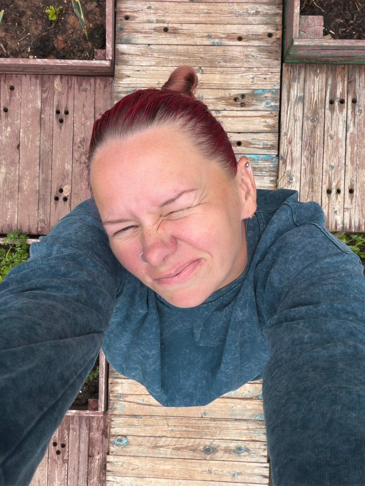 Storm clouds gather over Chaikovsky neighborhood, garden selfie alongside