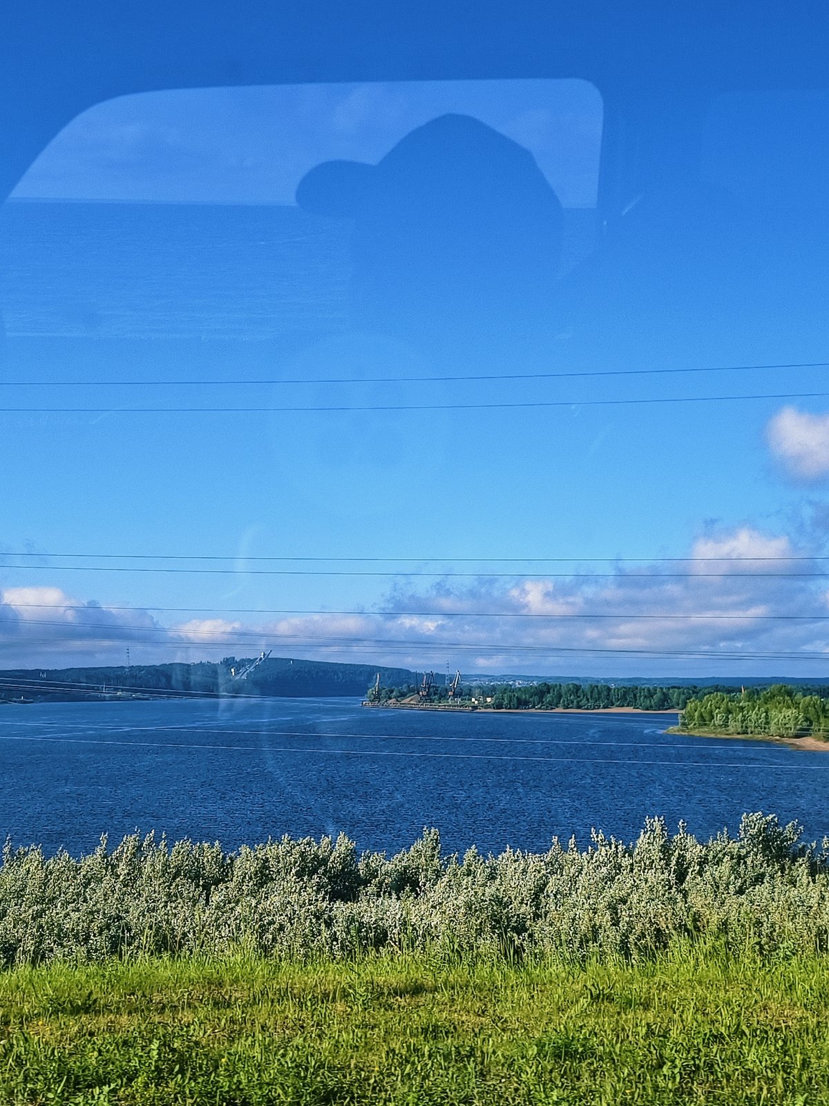 Calm morning view of Kama River documented near Chaikovsky