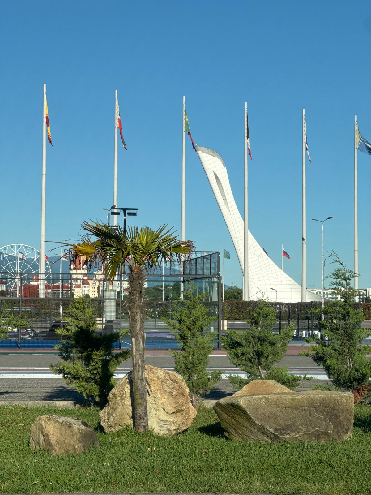 Colorful flags displayed at public space in Sirius, Russia