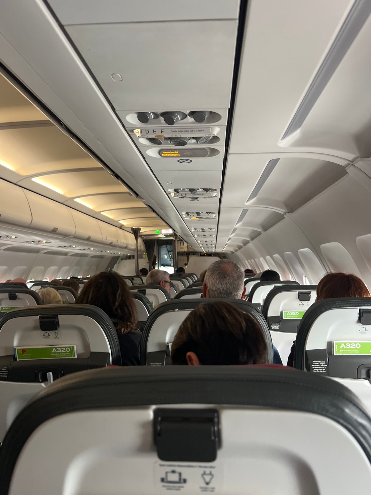 Passenger documents flight experience with selfies at Paris-Orly Airport