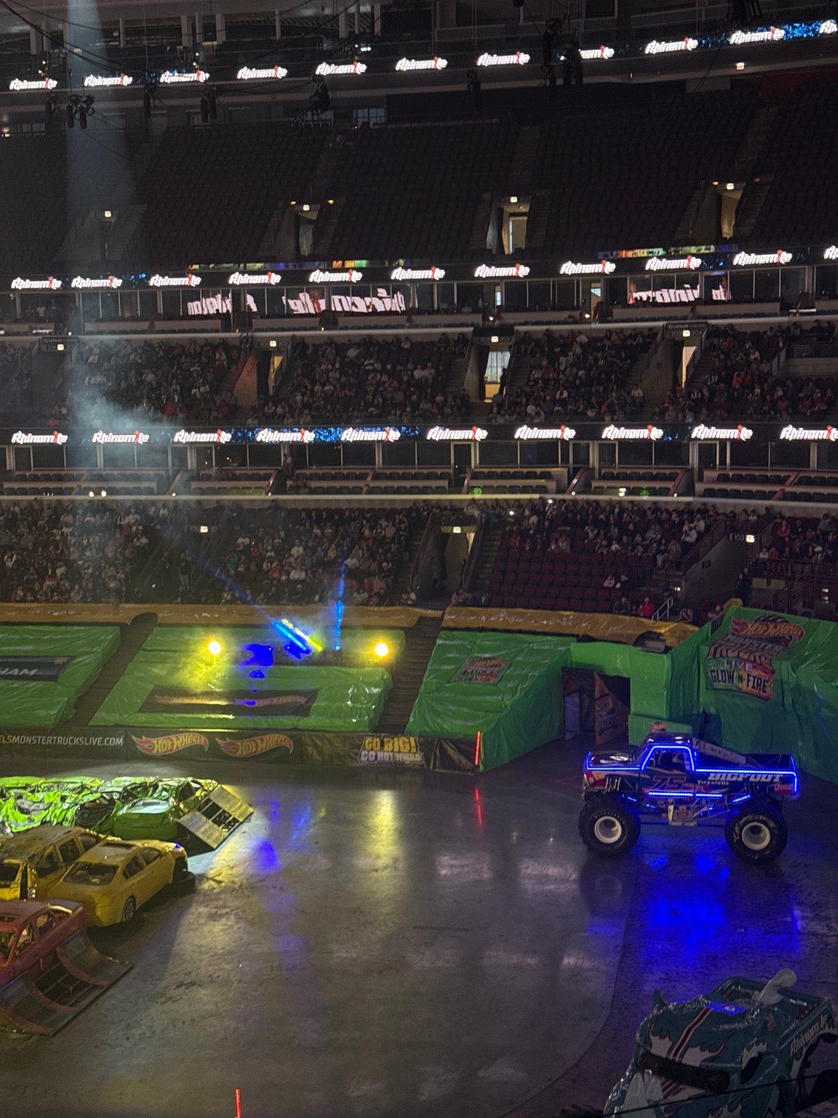 Monster truck rally lights up Chicago arena at night