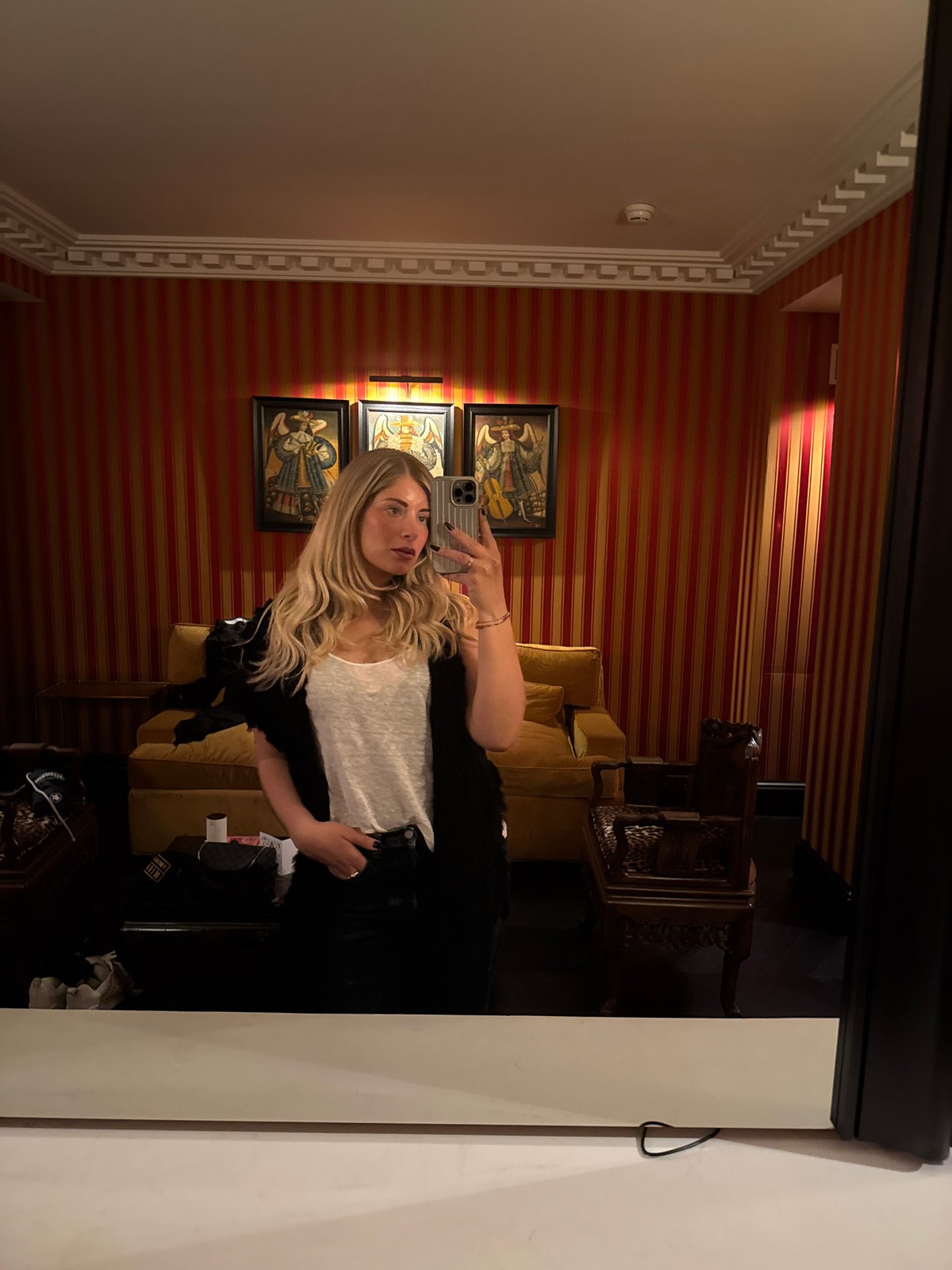 Woman Takes Selfies in Ornate Parisian Room