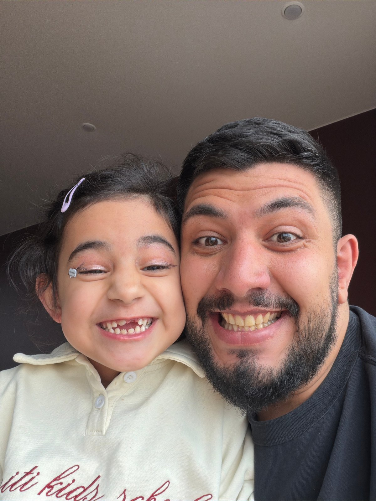 Father and daughter share photo moment in Krasnoyarsk