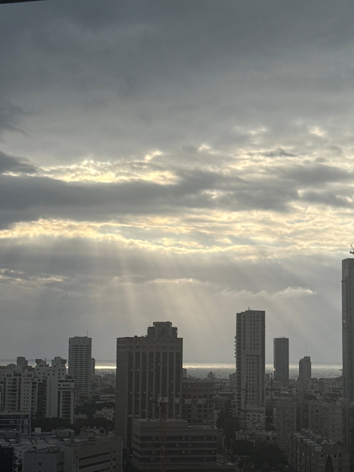 Tel Aviv cityscape photographed under dramatic skies