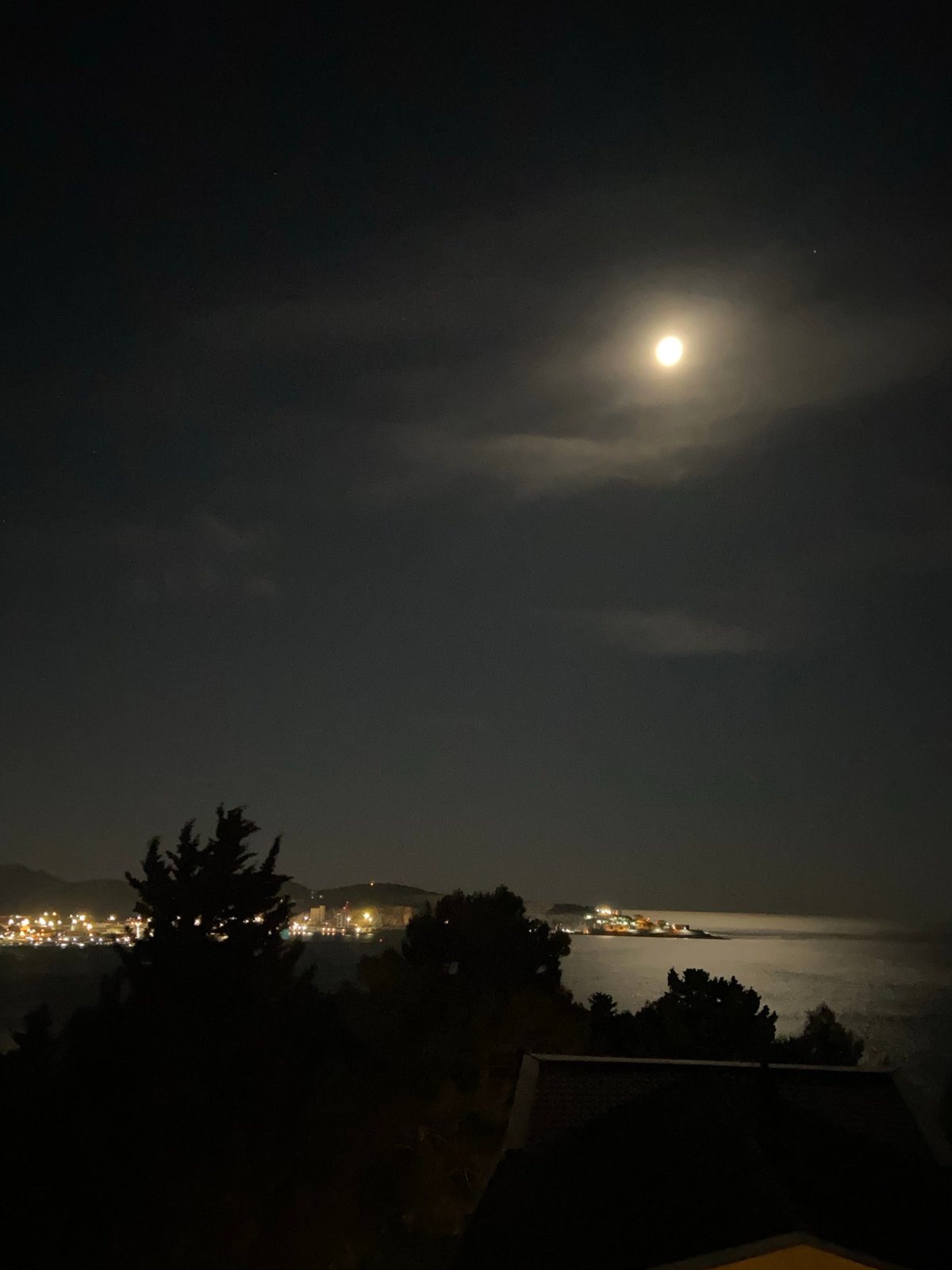 Nighttime coastal views documented in Šušanj, Montenegro under full moon