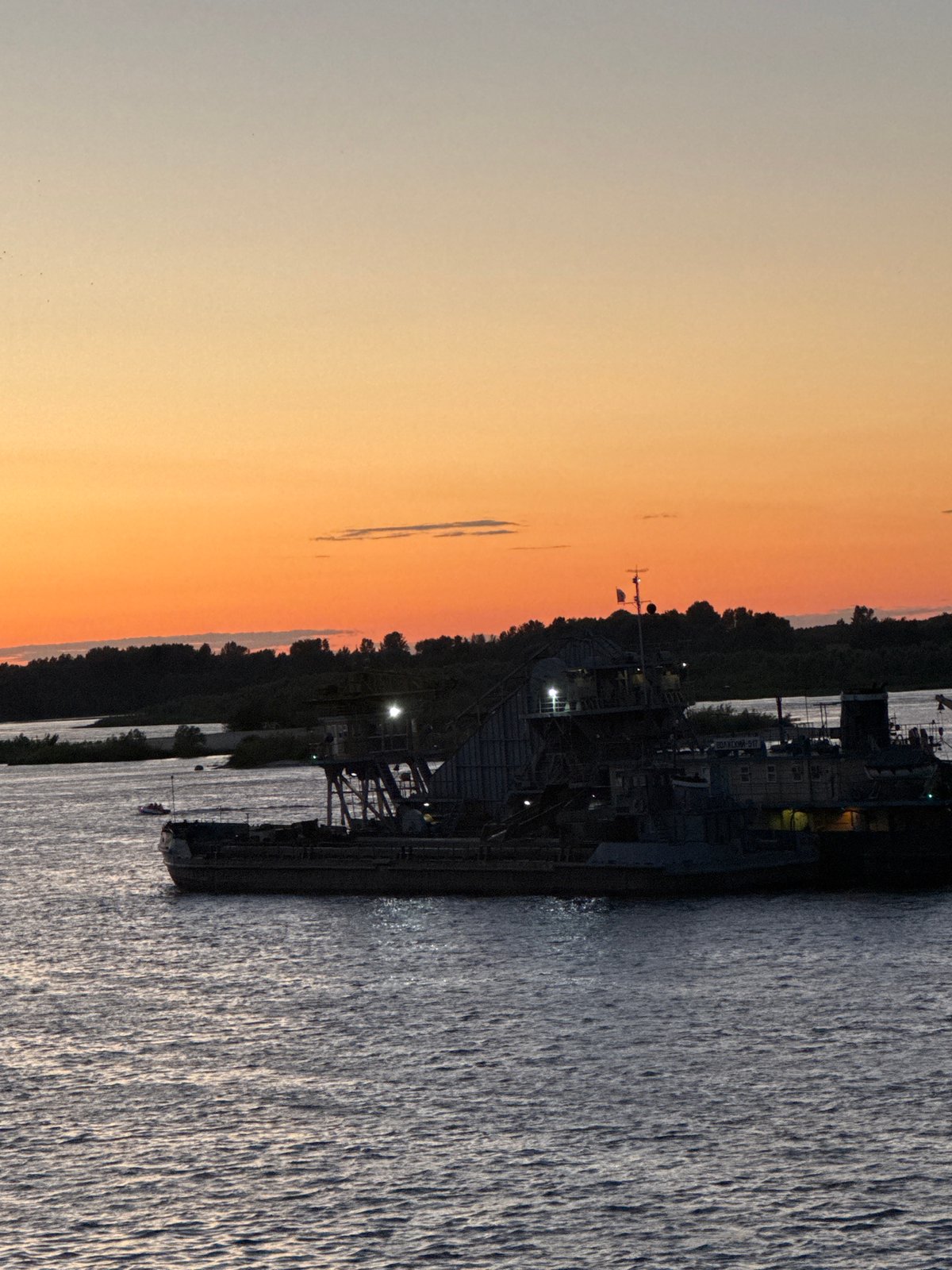 Nizhny Novgorod at dusk: Volga waterfront, stadium, and Kremlin