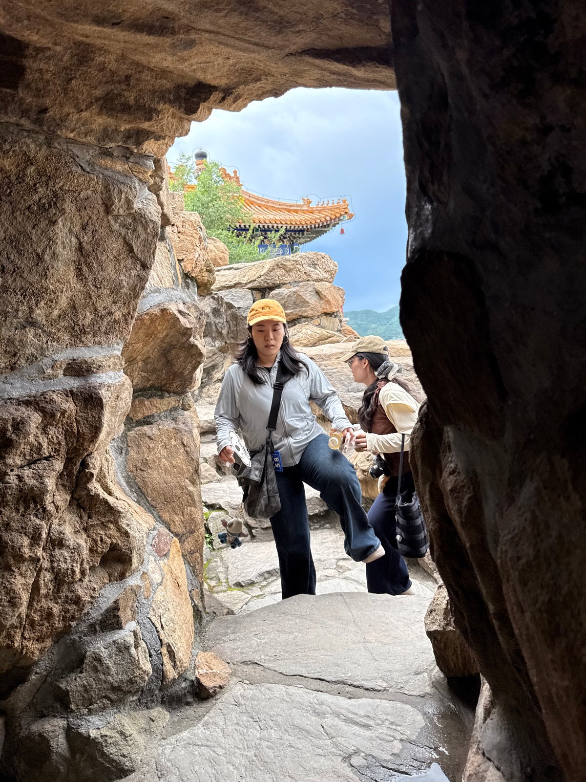 Early morning visitors explore Summer Palace stone features