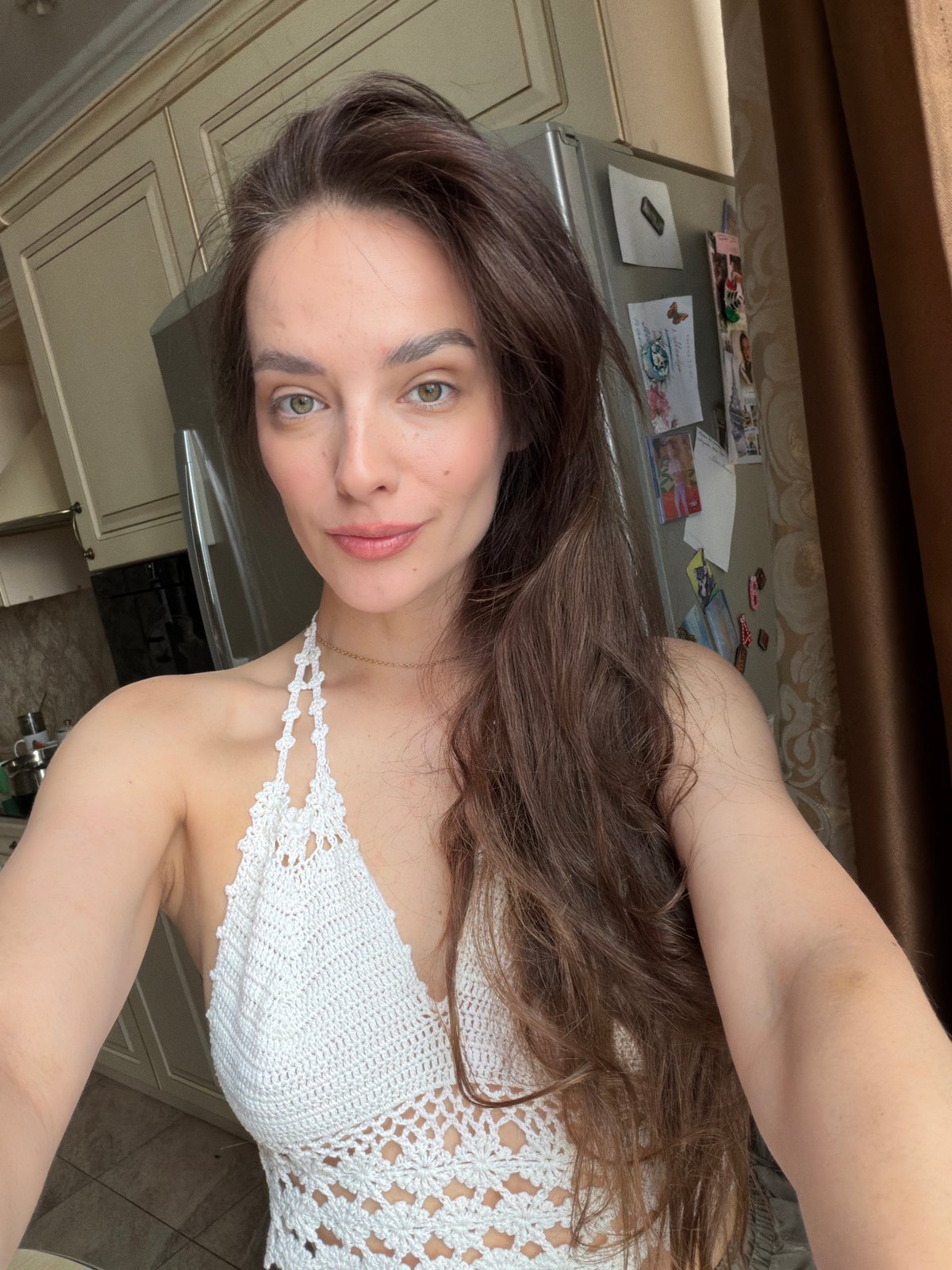 Kitchen selfie series in Ufa, same look, different poses