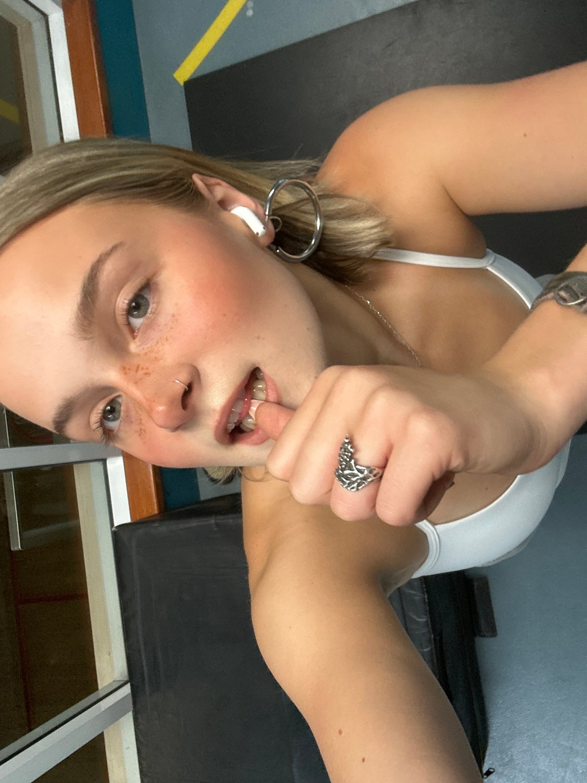 Woman takes selfies at Whistler squash court facility