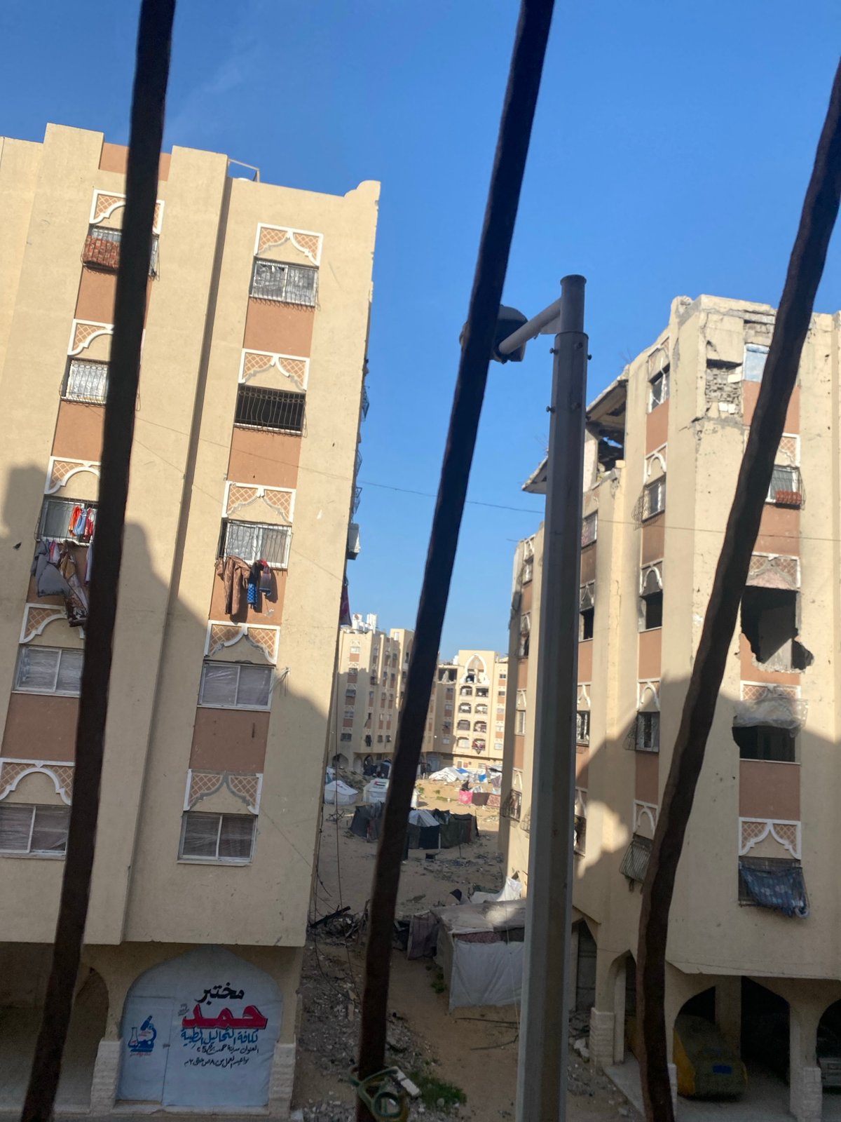 Urban architecture observed from interior viewpoint, multiple buildings documented