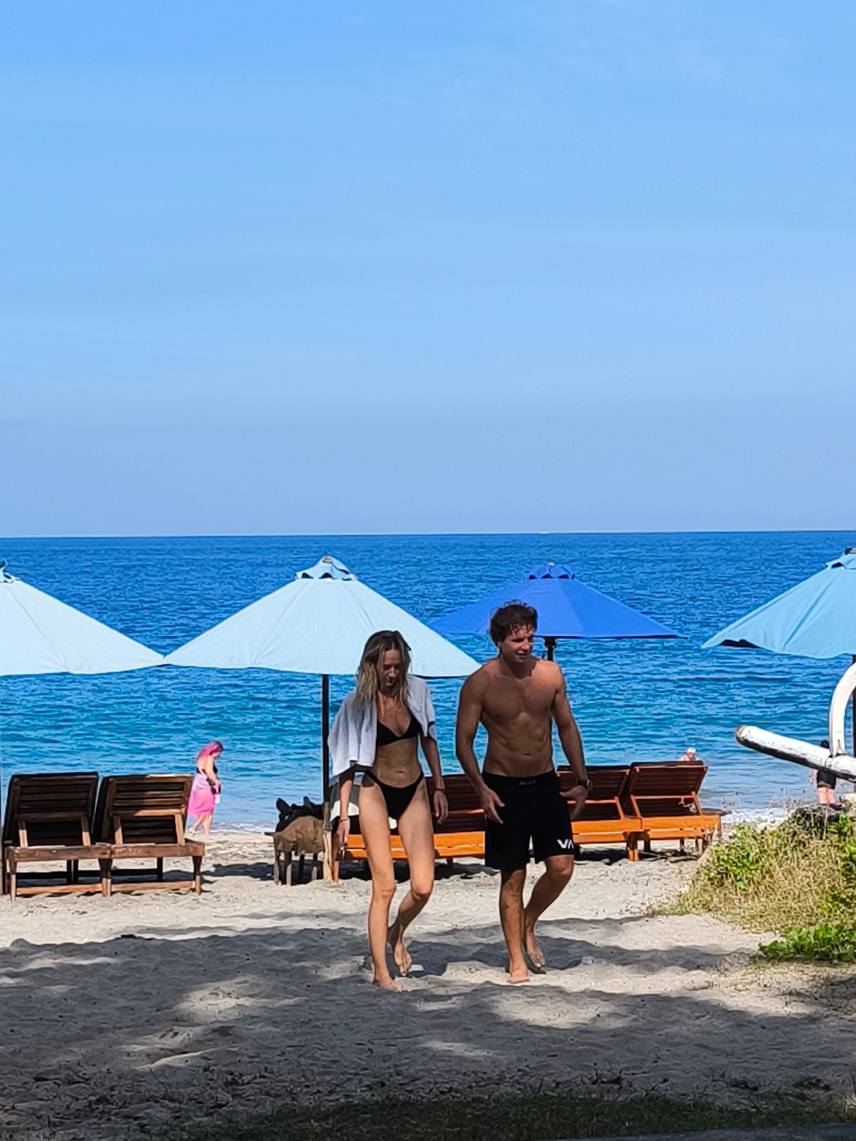 Beach resort activities captured in Karangasem tropical setting
