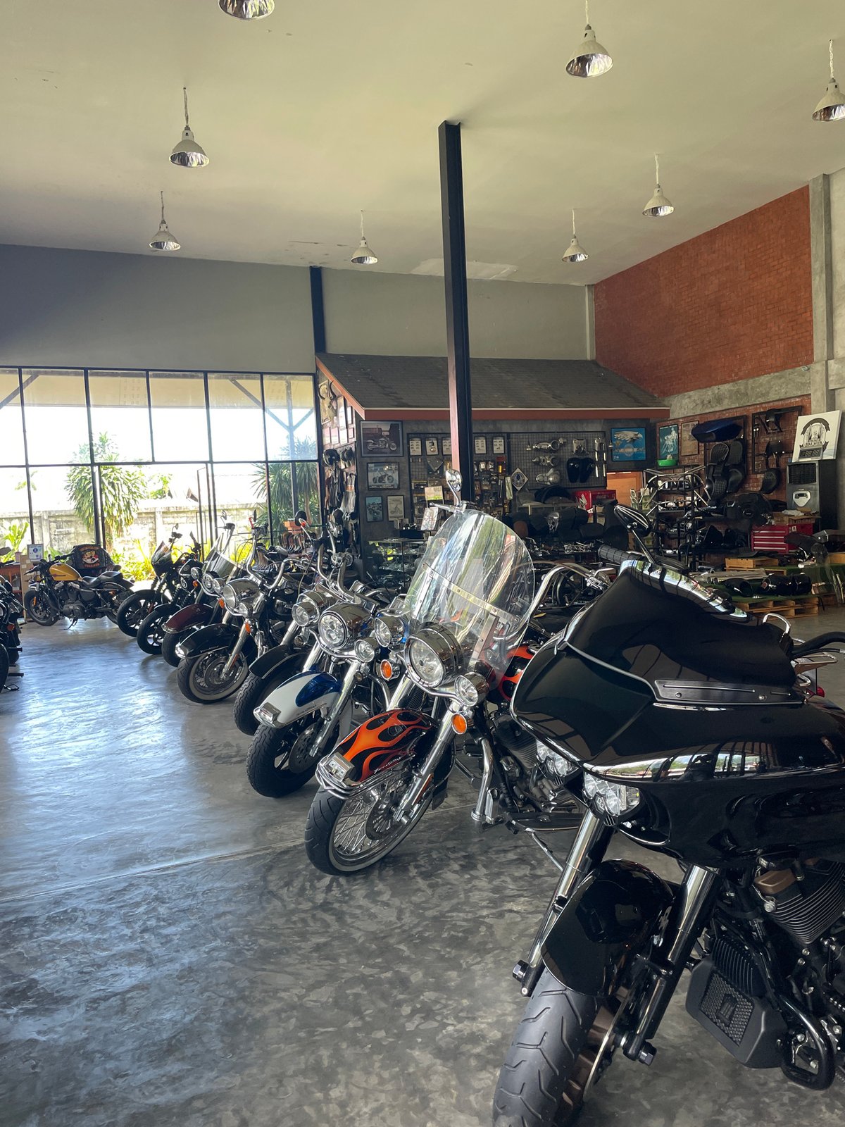 Motorcycle dealership showroom documented in Ban Yid, Thailand