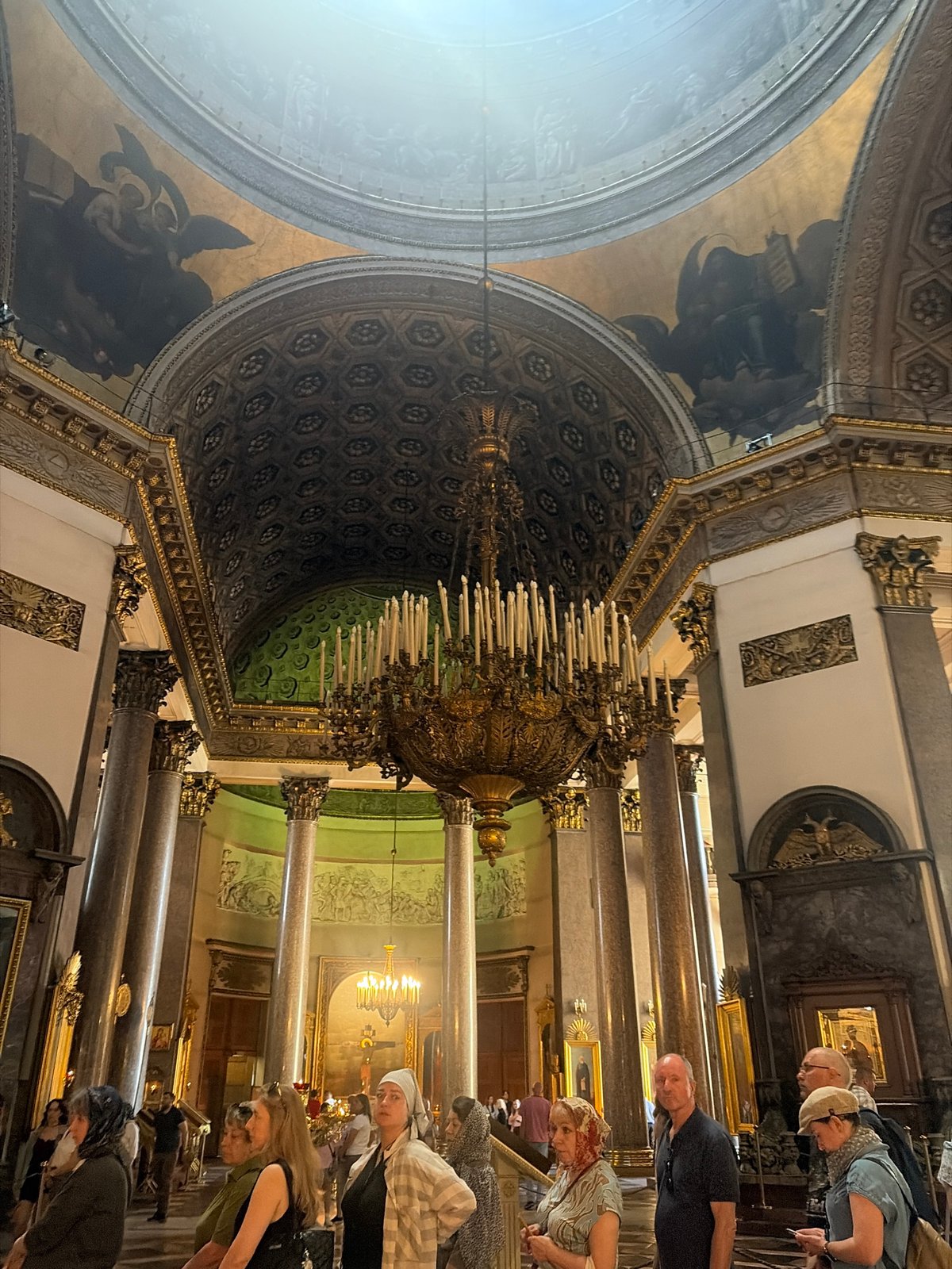 Inside an ornate cathedral, with a wizard outside