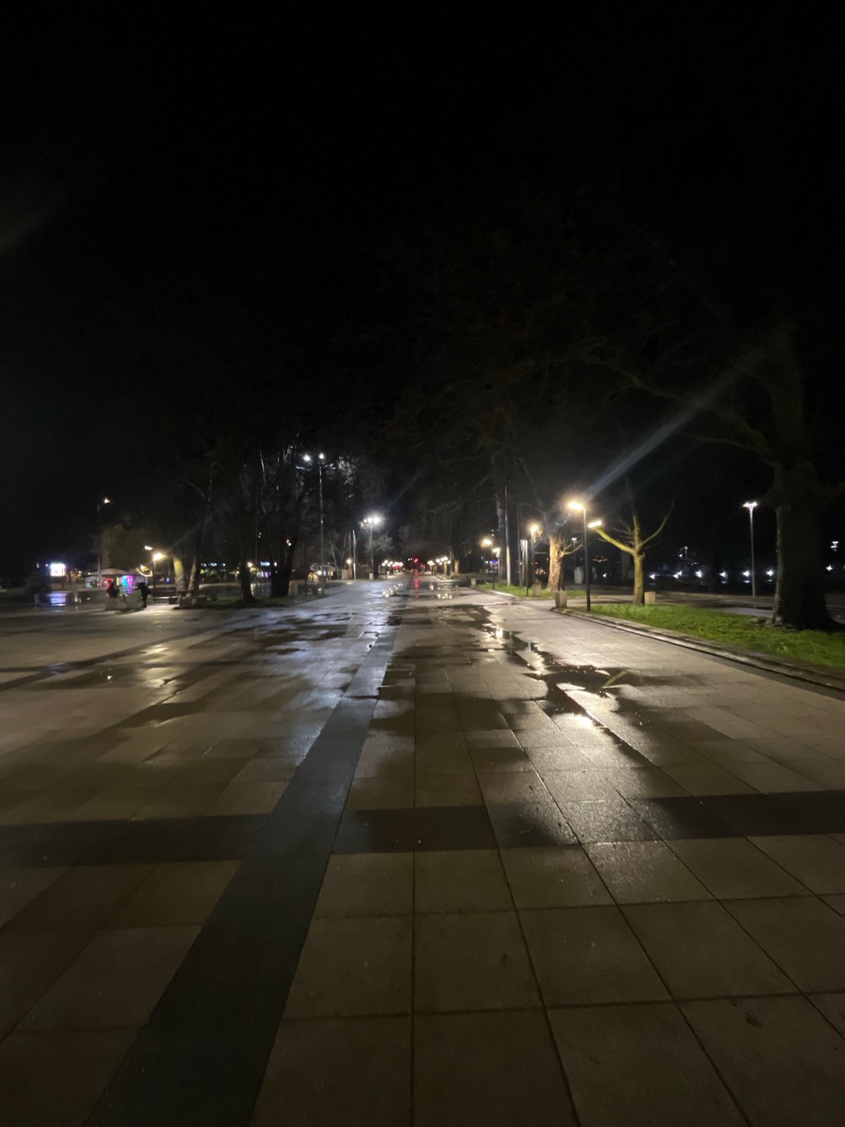 Rainy evening streetlight reflections observed in Montana, Bulgaria
