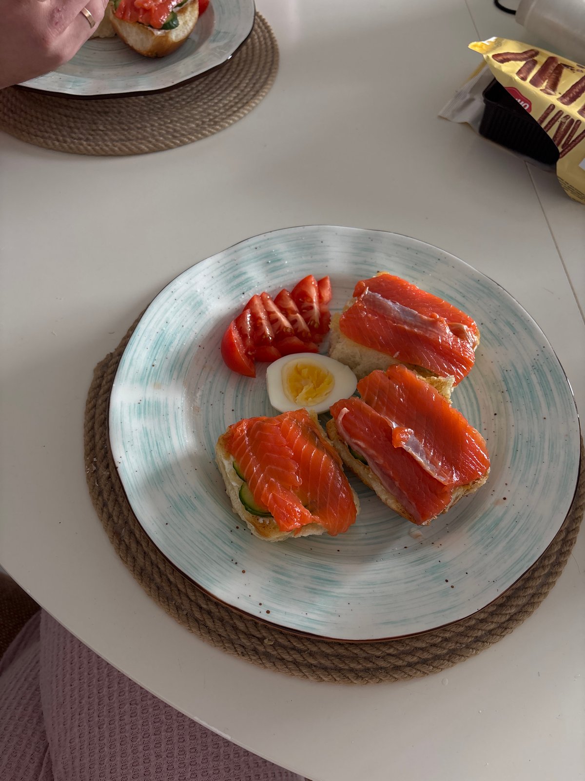 Salmon sandwiches photographed in triangular arrangement in Krasnoyarsk