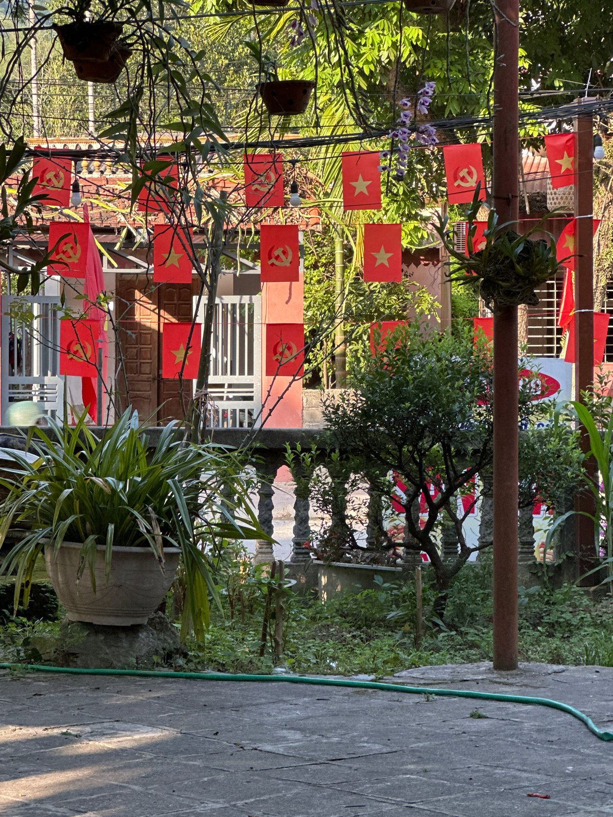 Vietnamese flags displayed in Bảo Nhai residential area