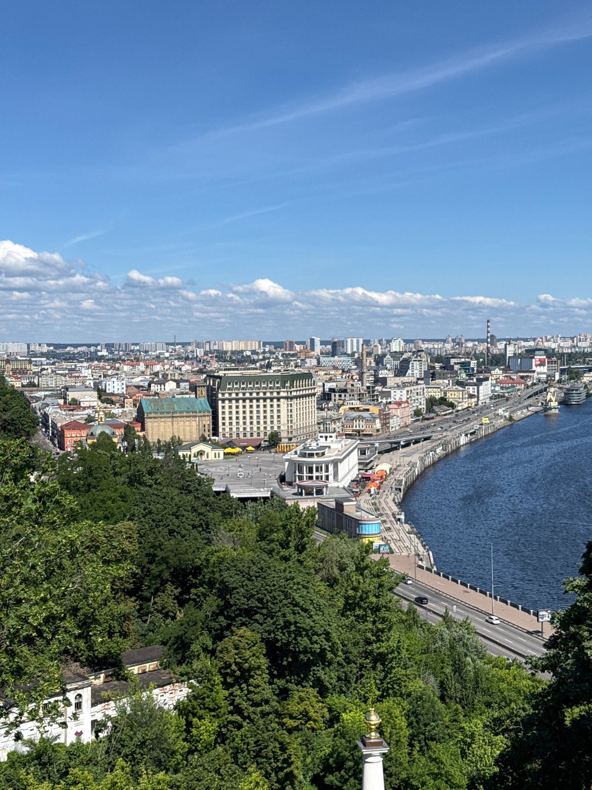 Kyiv landmarks, war memorials, and riverside views on a sunny morning