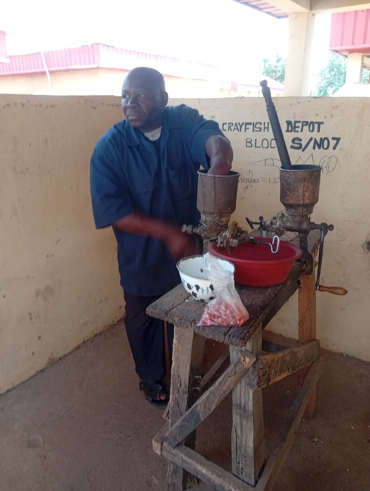 Food processing and market activities documented in unidentified location