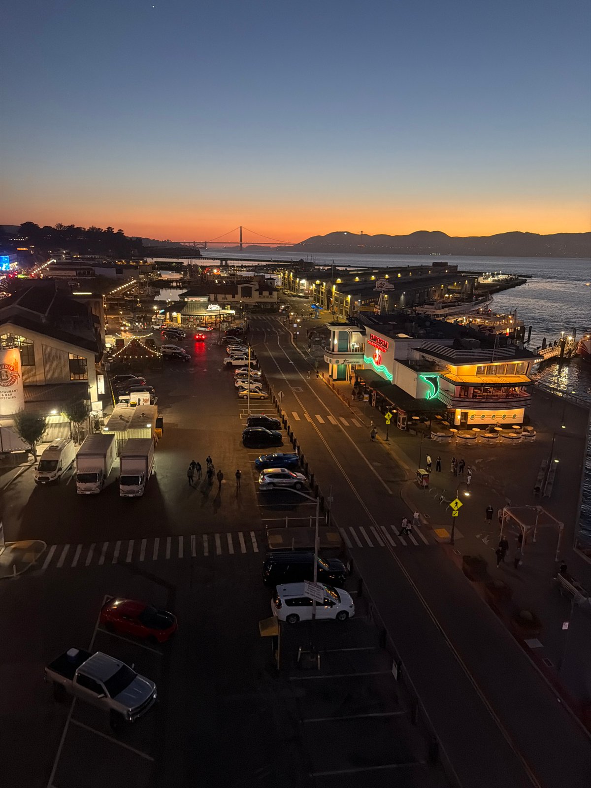 Fisherman's Wharf at dusk, Golden Gate on the horizon