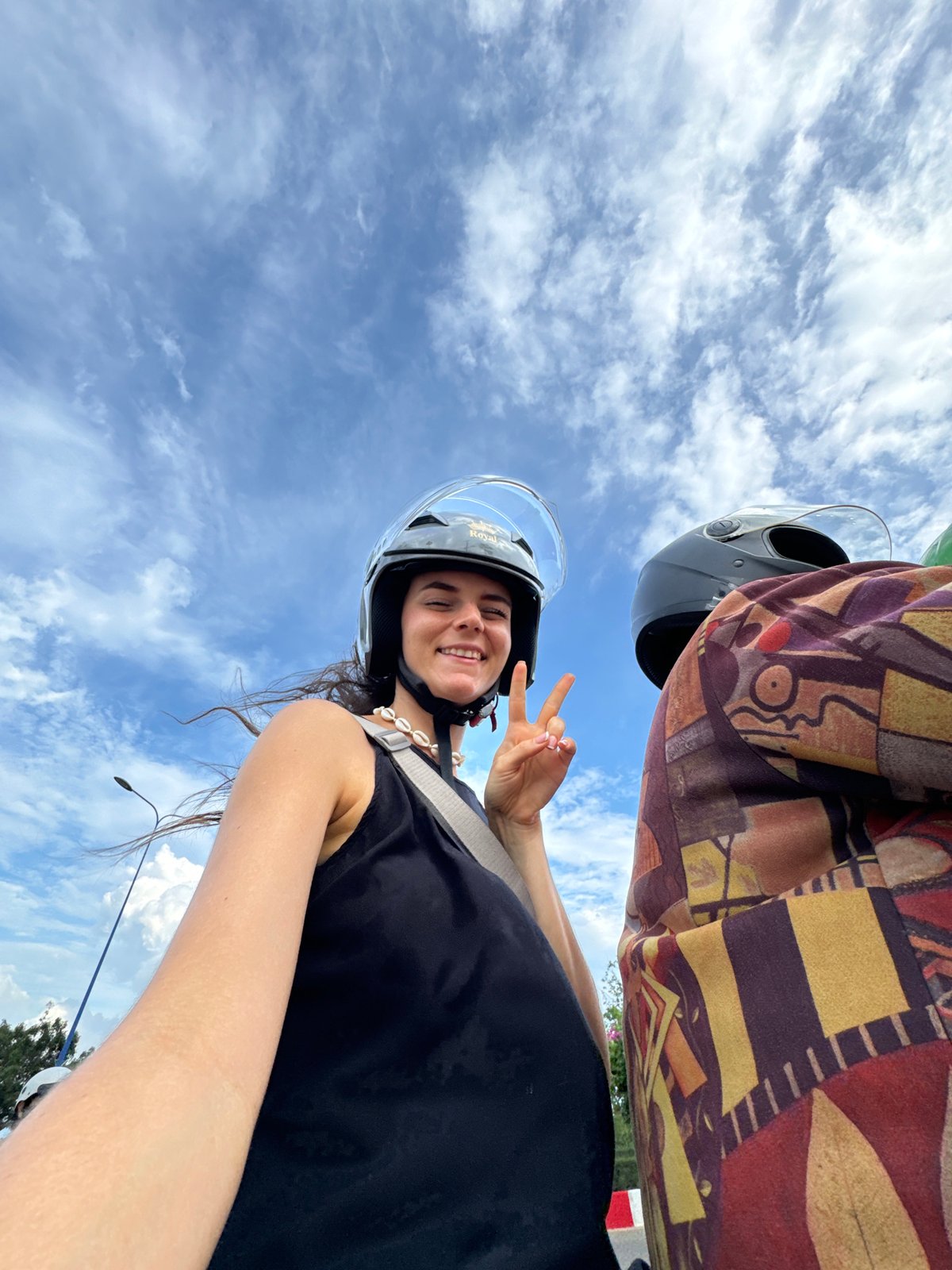 Tourists photographed during scooter ride in Mũi Né, Vietnam