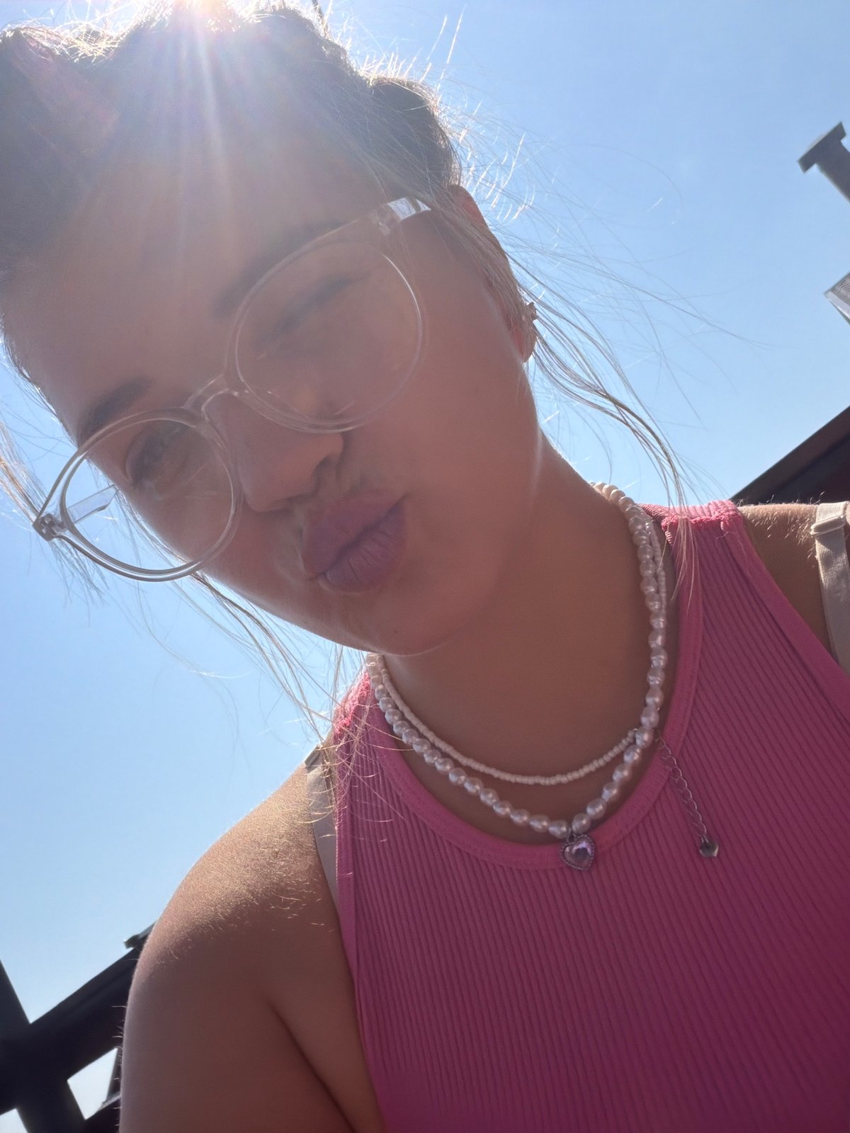 Woman takes playful selfies in Большая Шильна, Russia