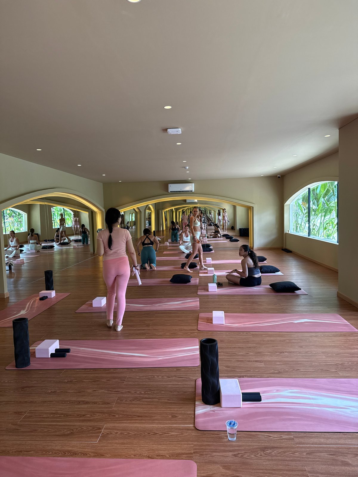 Morning yoga and Pilates classes draw women in Kuta