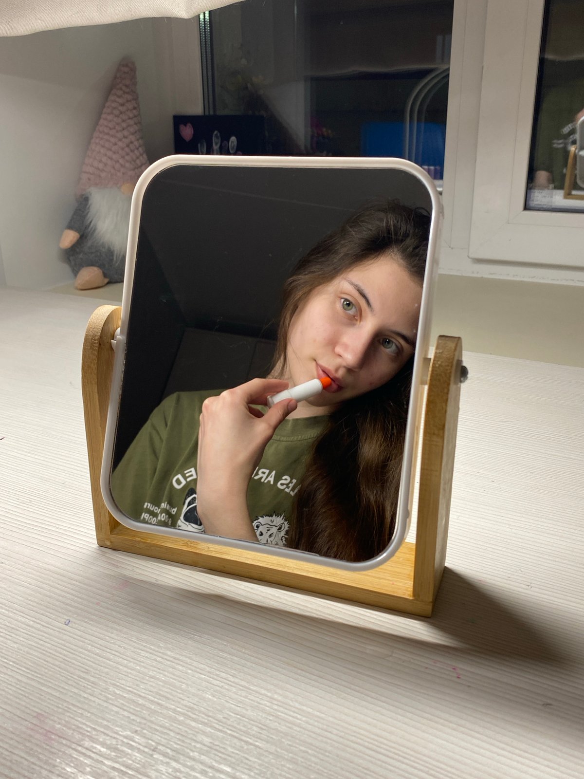 Woman's casual moments captured in mirrors during Votkinsk evening