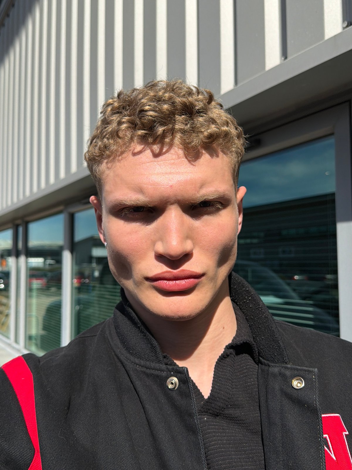 Young man photographed in close-up portrait in Trafford