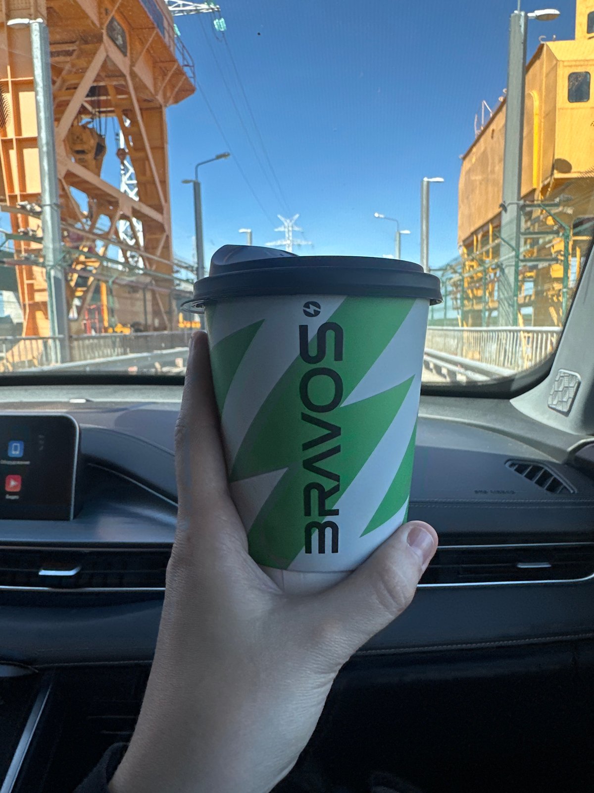 Morning coffee moment captured in vehicle, Chaikovsky Russia