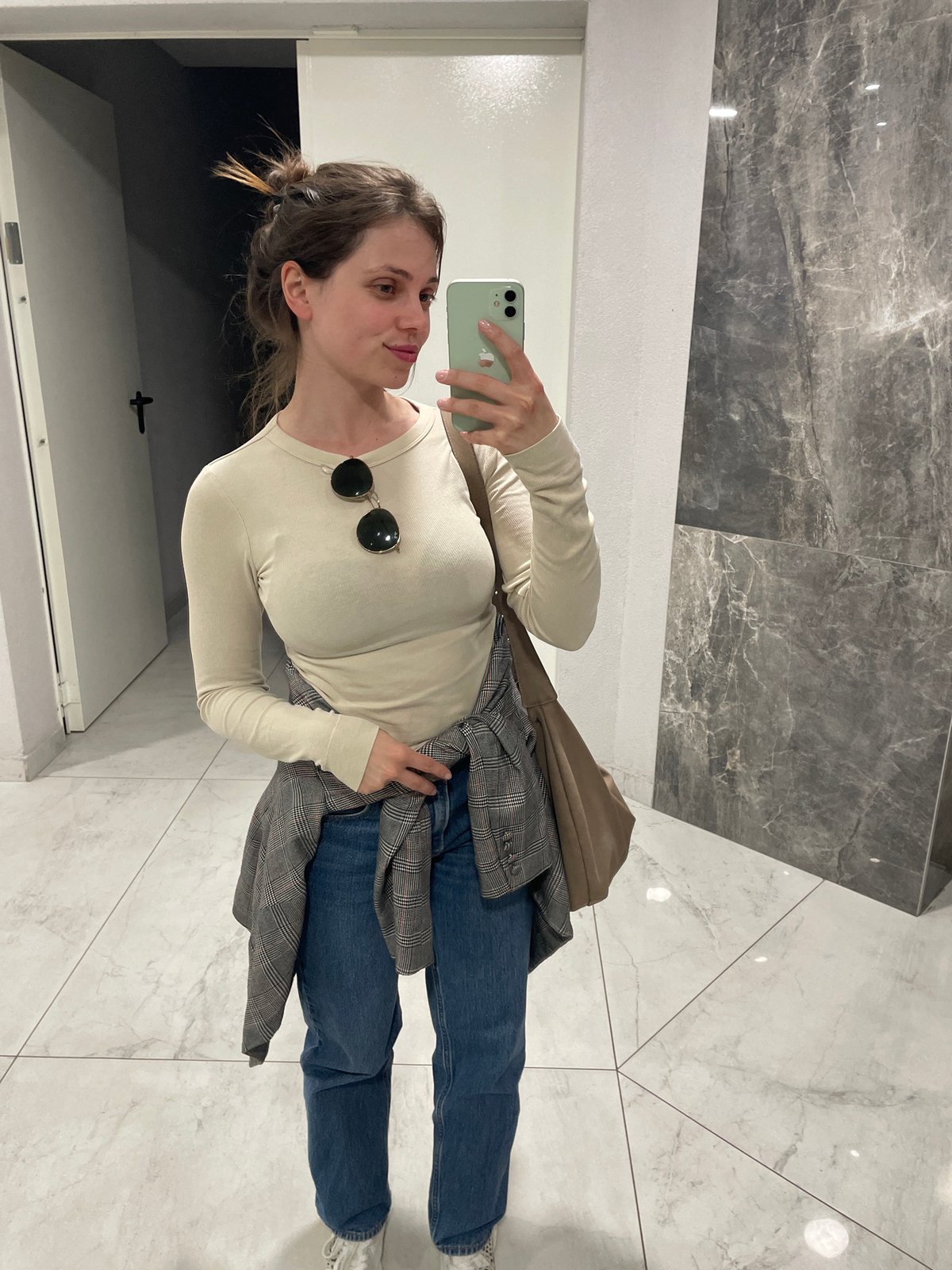 Woman takes selfies indoors in Novi Sad