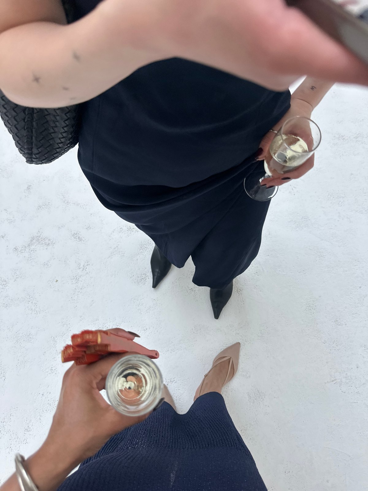 Champagne in hand, outdoor social moment in London