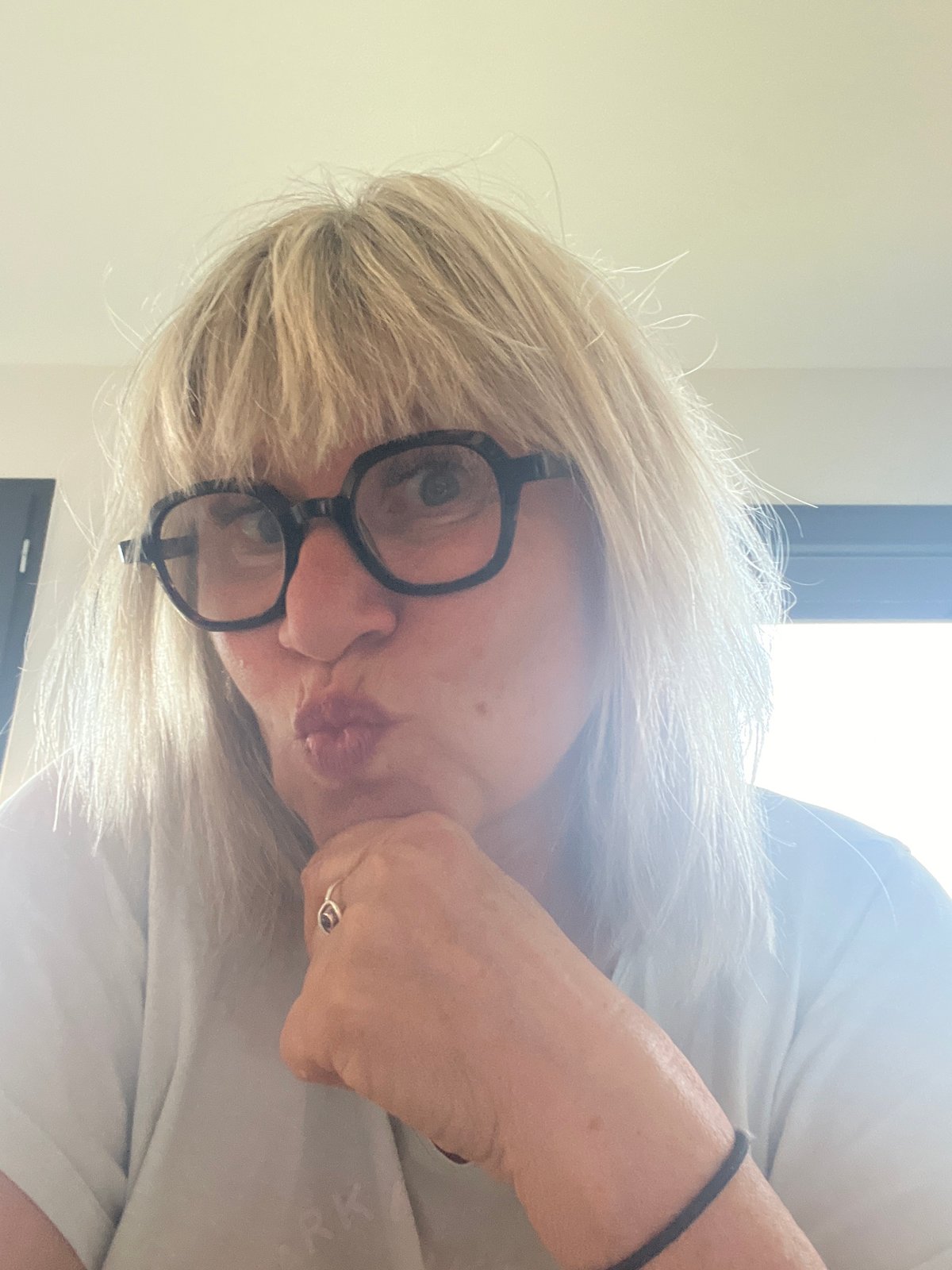 Portrait of blonde person with glasses captured in Chambœuf