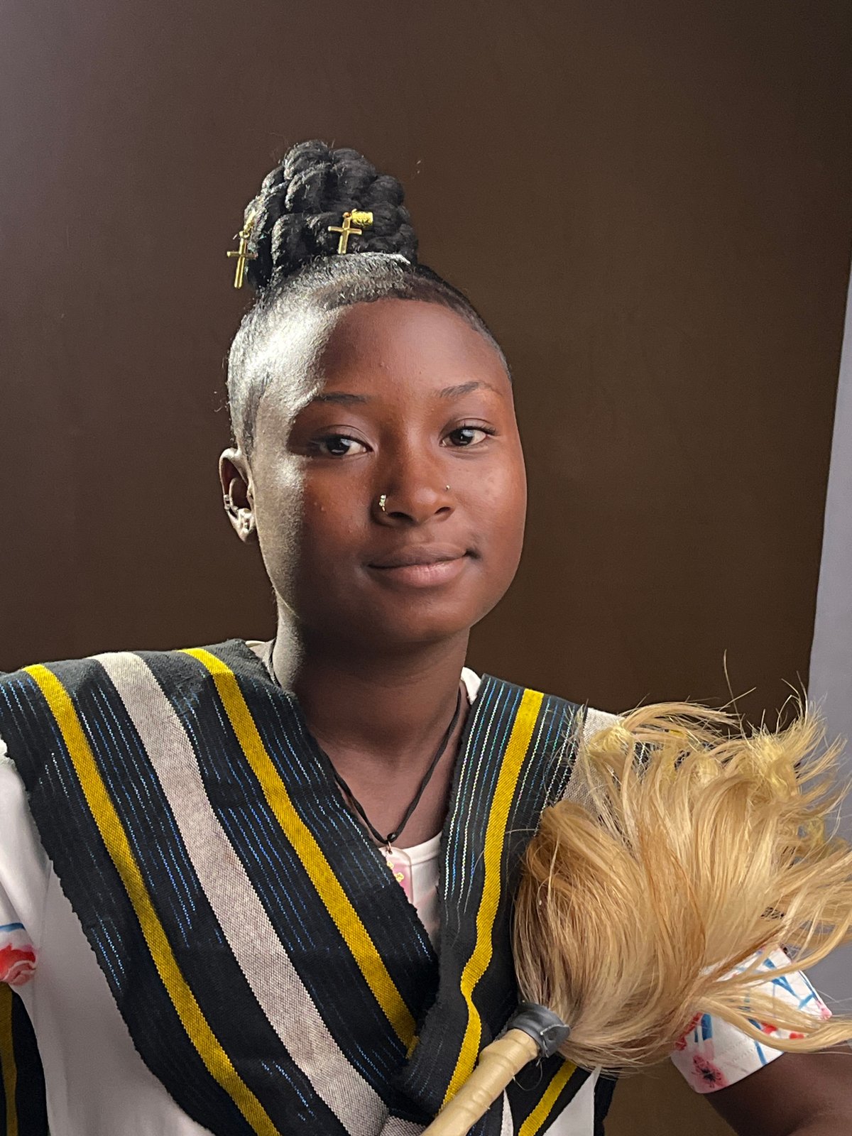 Portrait session documents young woman in Nigeria with #Tradition hashtag