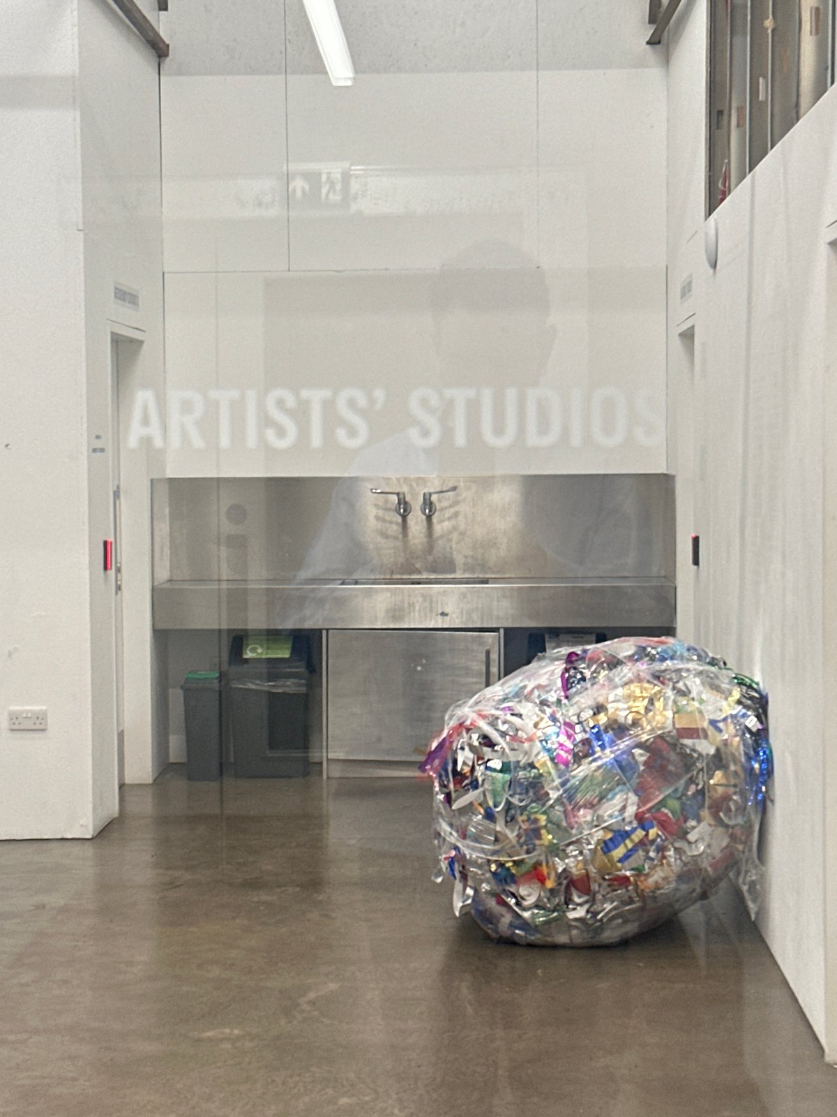 Artist studio workspace documented in London with materials collection