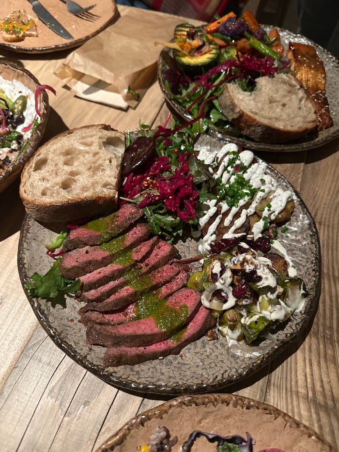 London dinner outing documented with multiple courses and drinks