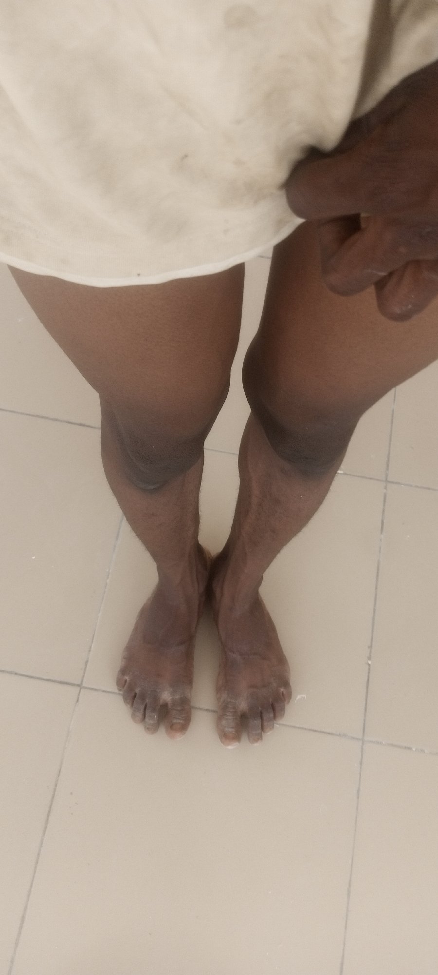 Person observed at construction site with exposed wiring in Rido