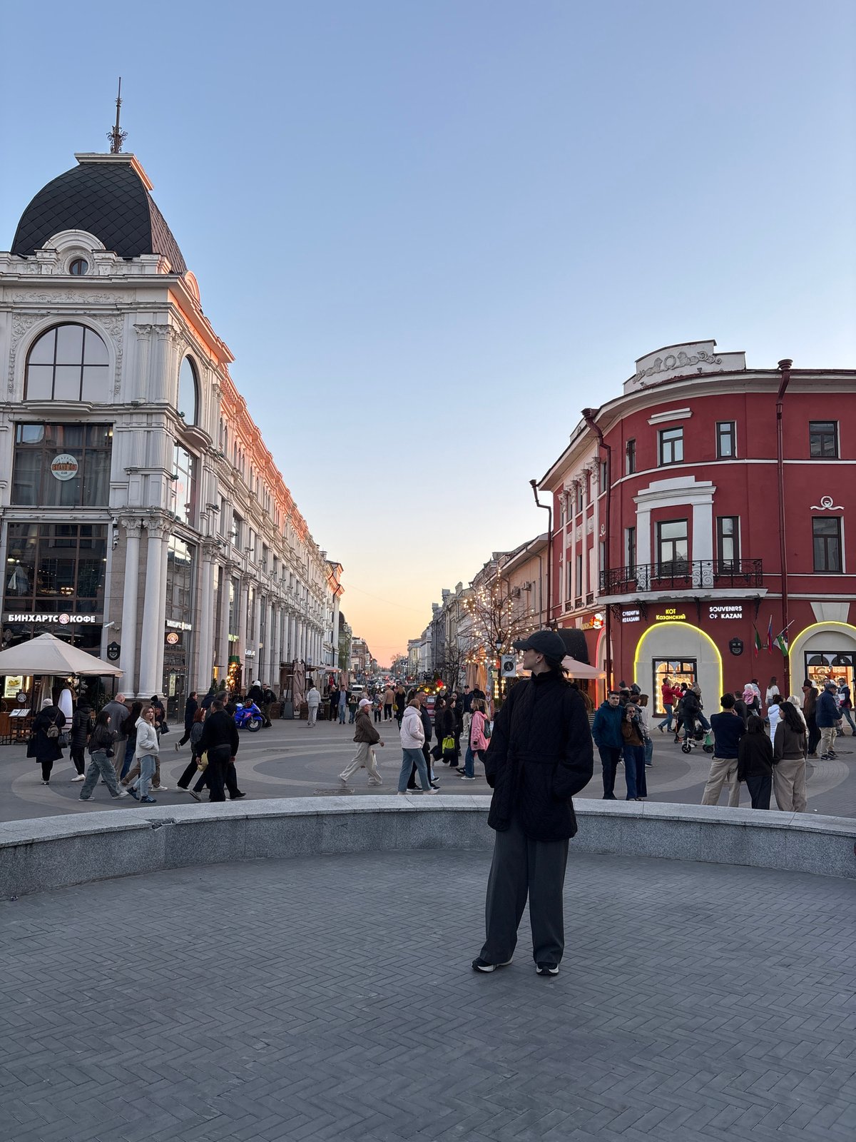 Tourists and locals captured strolling historic Kazan street district