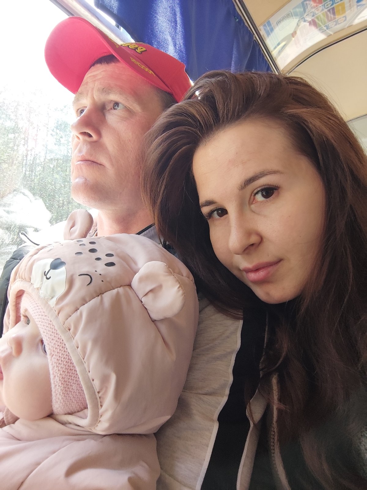 Family with infant travels by public transport in Garevaya